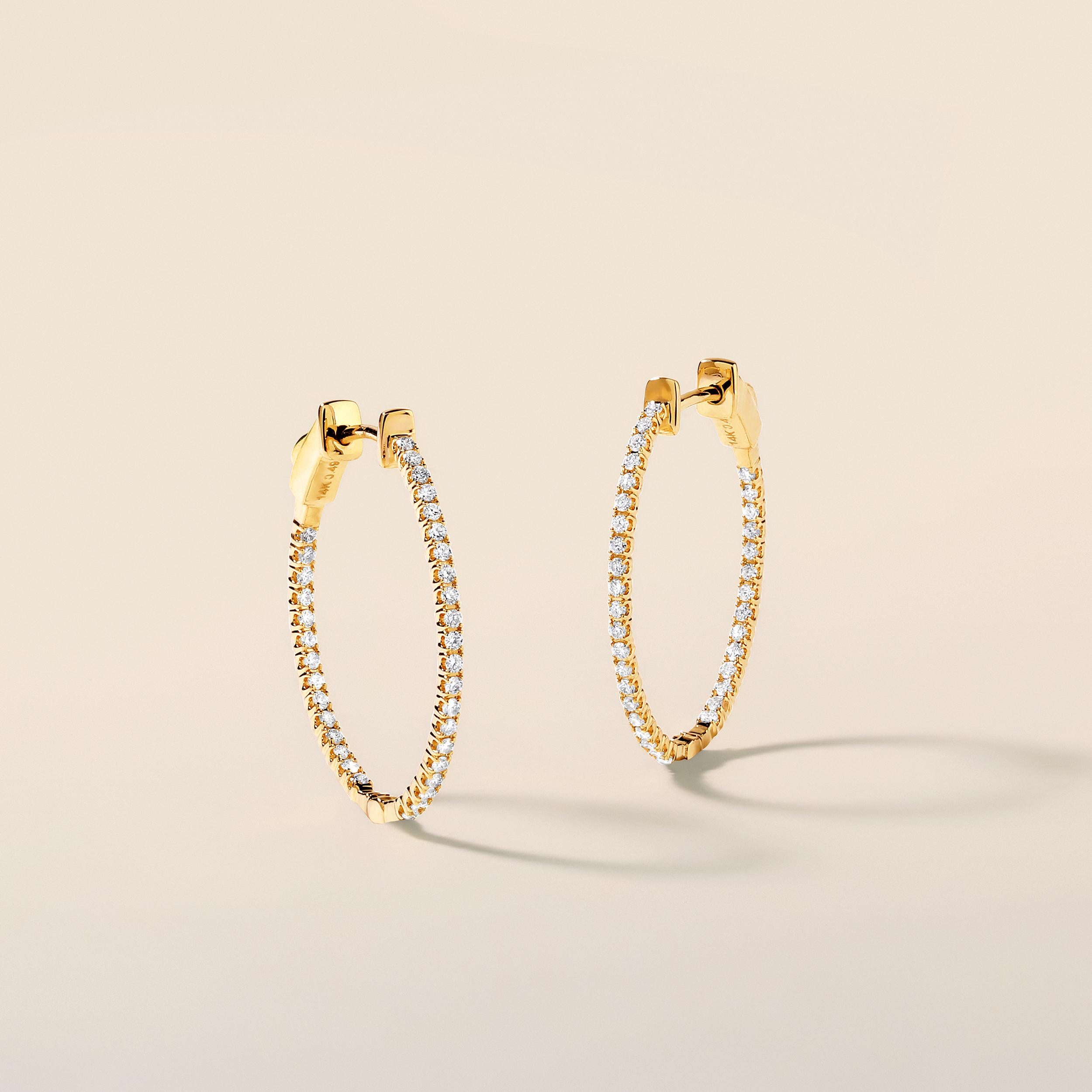 Crafted in 3.1 grams of 14K Yellow Gold, the earrings contains 70 stones of Round Diamonds with a total of 0.49 carat in F-G color and SI clarity.

CONTEMPORARY AND TIMELESS ESSENCE: Crafted in 14-karat/18-karat with 100% natural diamond and