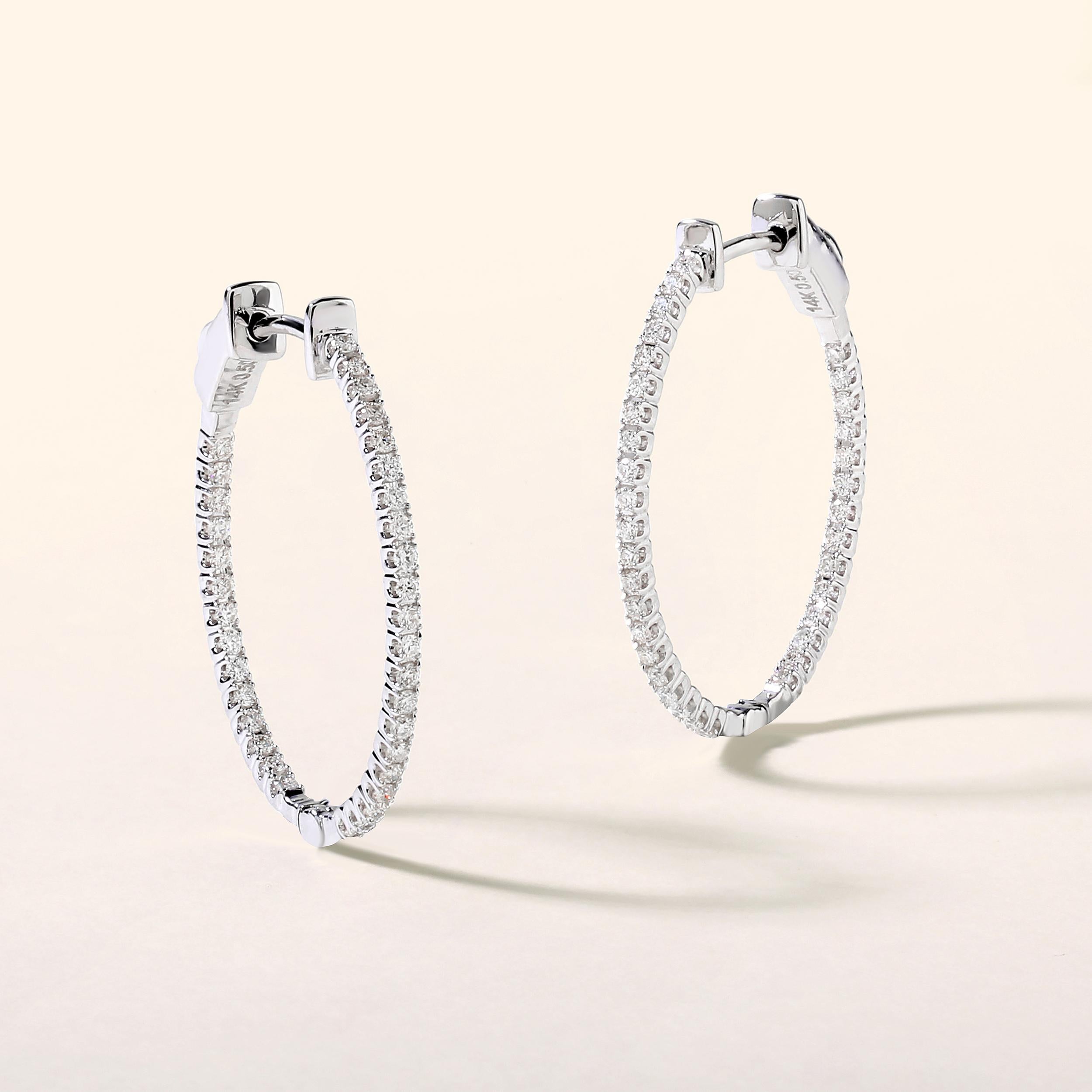 Crafted in 3.11 grams of 14K White Gold, the earrings contains 70 stones of Round Diamonds with a total of 0.5 carat in G-H color and SI clarity.

This jewelry piece will be expertly crafted by our skilled artisans upon order. Allow us a shipping