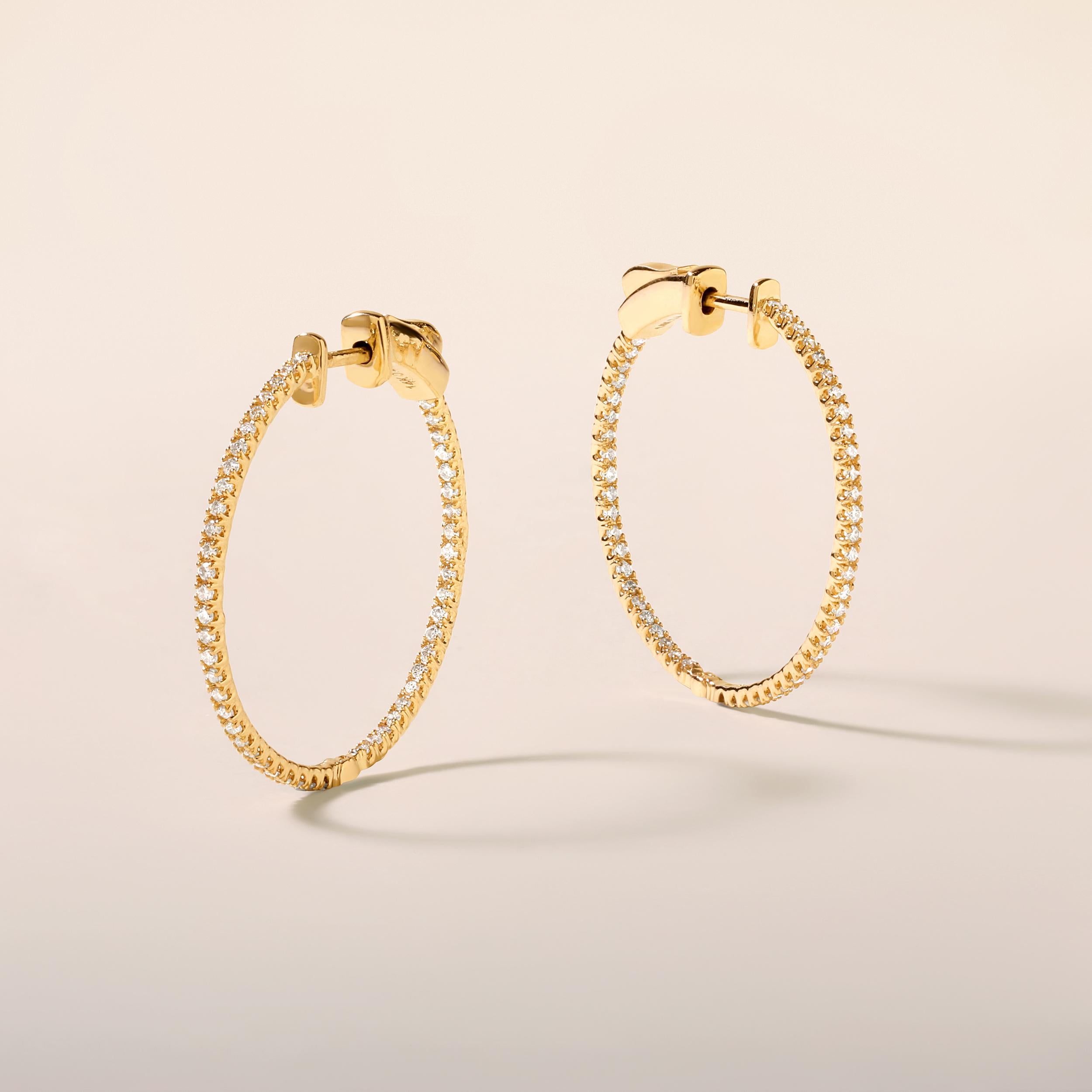 Crafted in 3.23 grams of 14K Yellow Gold, the earrings contains 100 stones of Round Diamonds with a total of 0.49 carat in G-H color and SI clarity.

CONTEMPORARY AND TIMELESS ESSENCE: Crafted in 14-karat/18-karat with 100% natural diamond and