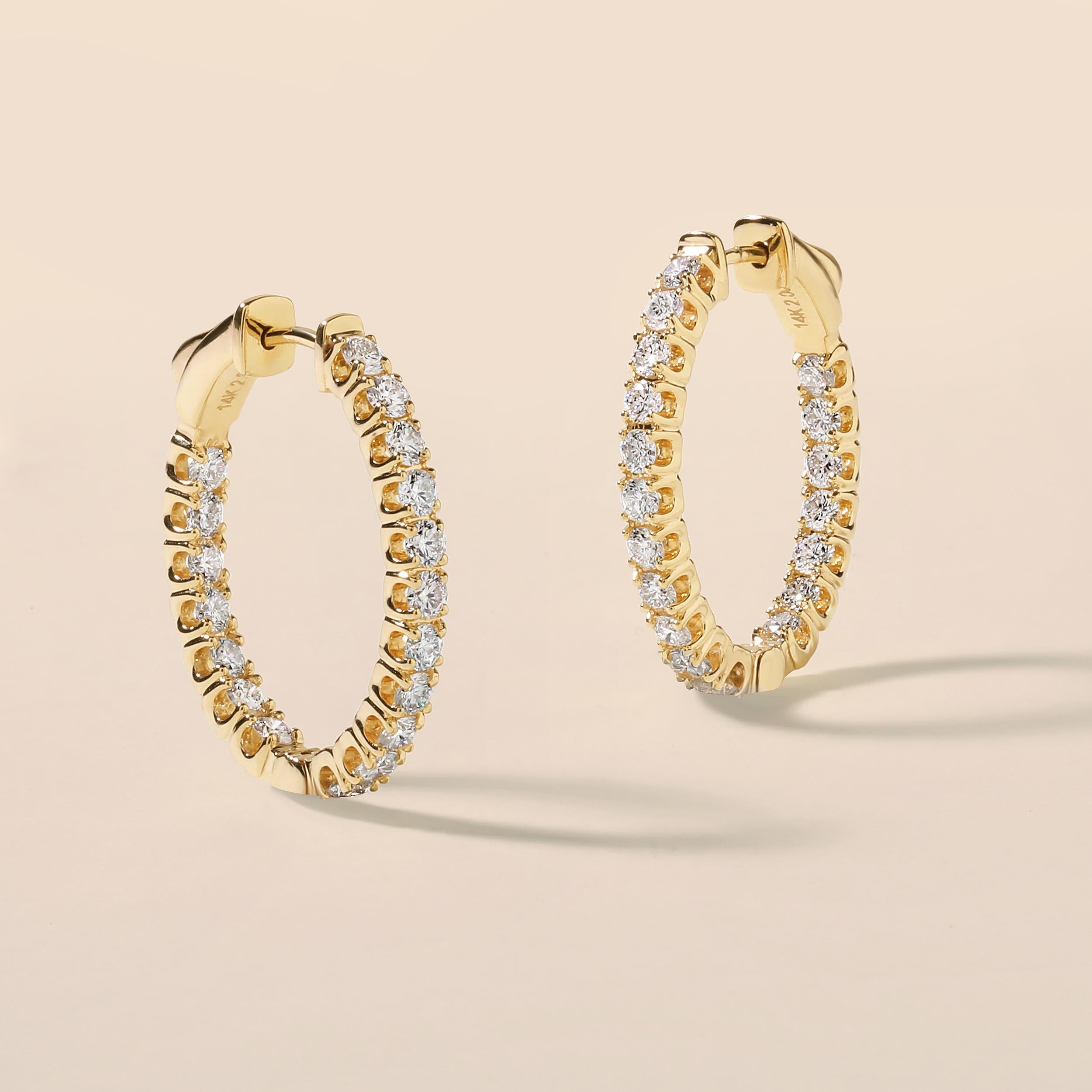 Crafted in 7.55 grams of 14K Yellow Gold, the earrings contains 36 stones of Round Diamonds with a total of 2 carat in G-H color and SI clarity.

This jewelry piece will be expertly crafted by our skilled artisans upon order. Allow us a shipping
