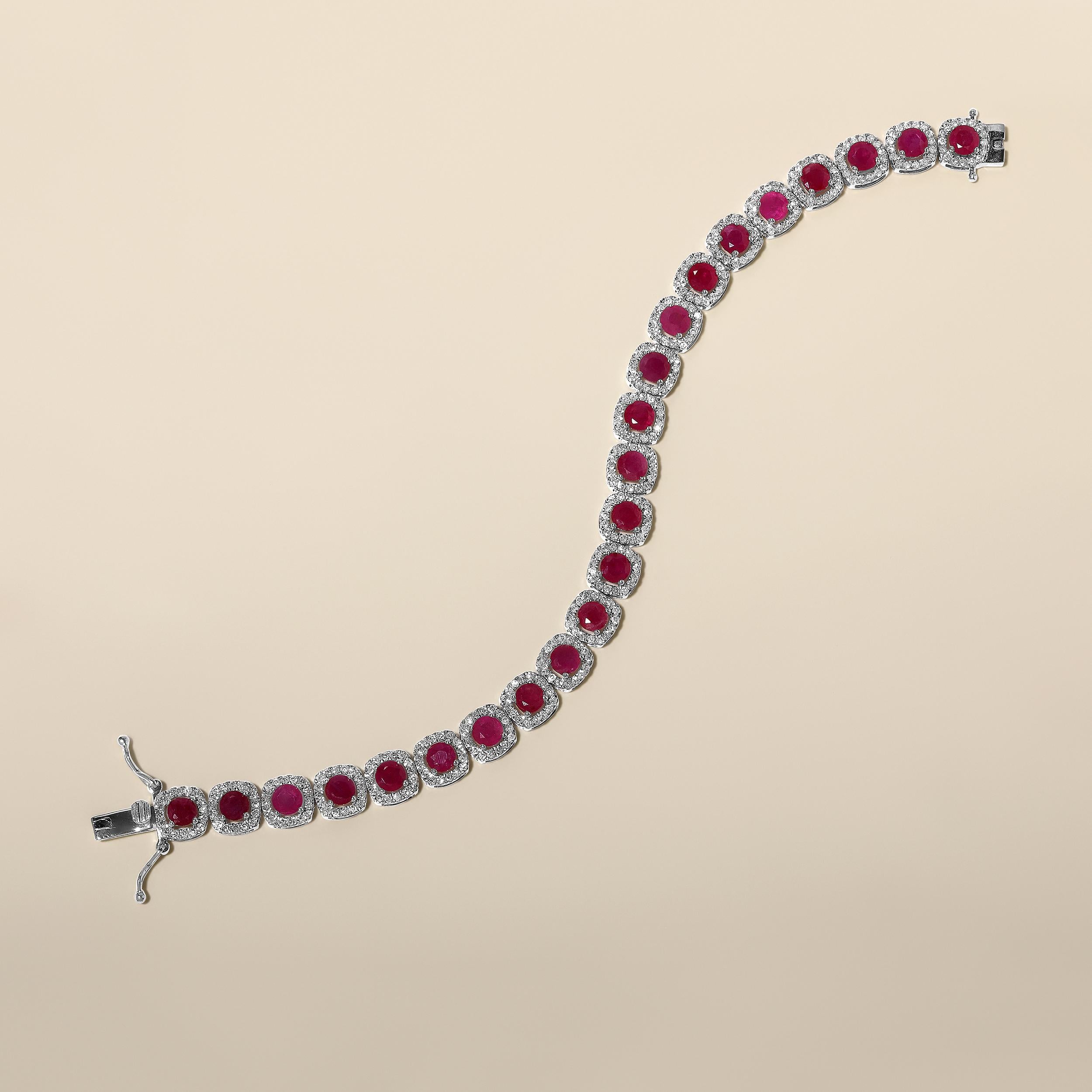 Crafted in 14.35 grams of 14K White Gold, the bracelet contains 368 stones of Round Natural Diamonds with a total of 2.59 carat in G-H color and I1-I2 clarity combined with 23 stones of Round Shaped Natural Ruby Gemstones with a total of 10.52