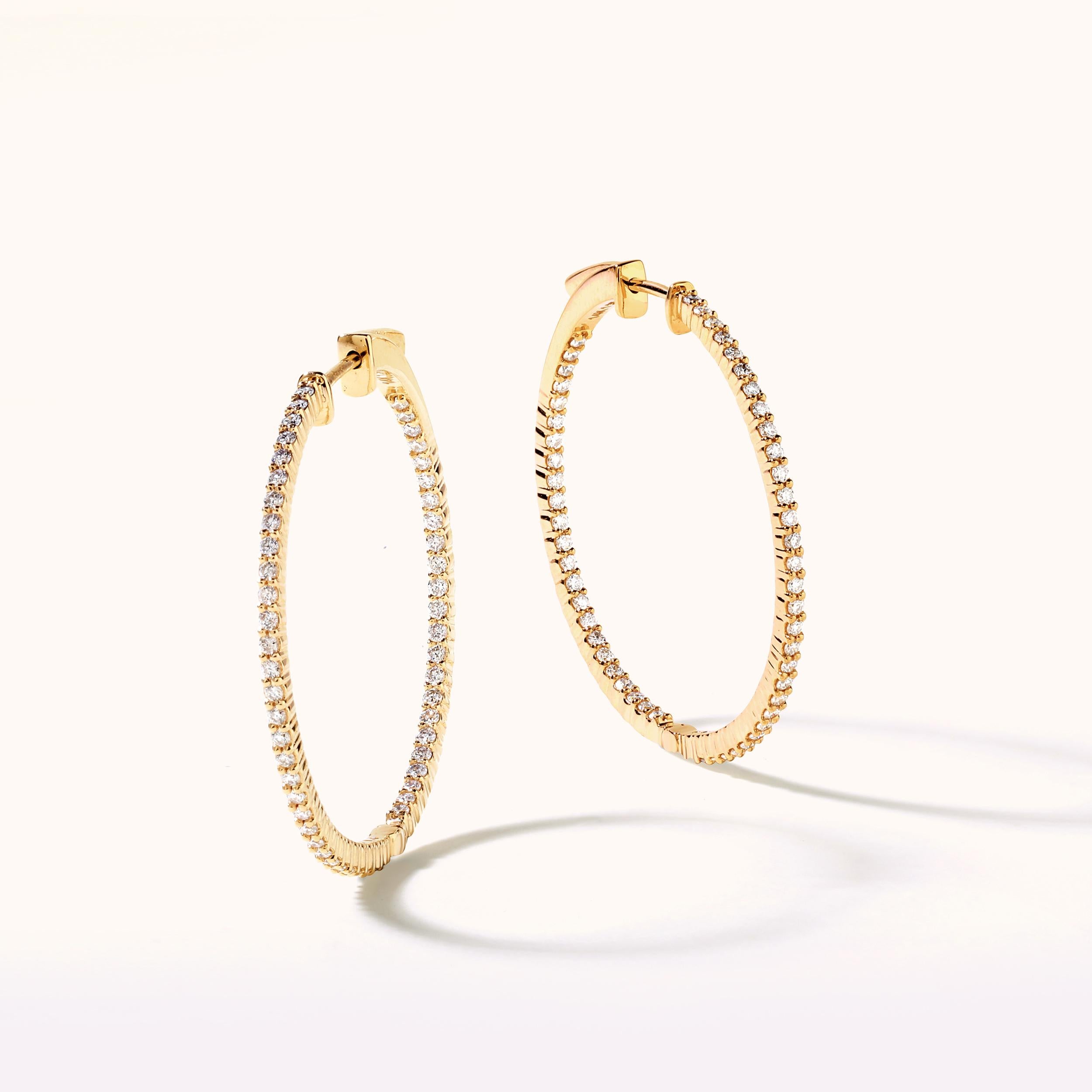 Crafted in 8.5 grams of 14K Yellow Gold, the earrings contains 108 stones of Round Diamonds with a total of 1.35 carat in G-H color and SI clarity.
This jewelry piece will be expertly crafted by our skilled artisans upon order. Allow us a shipping