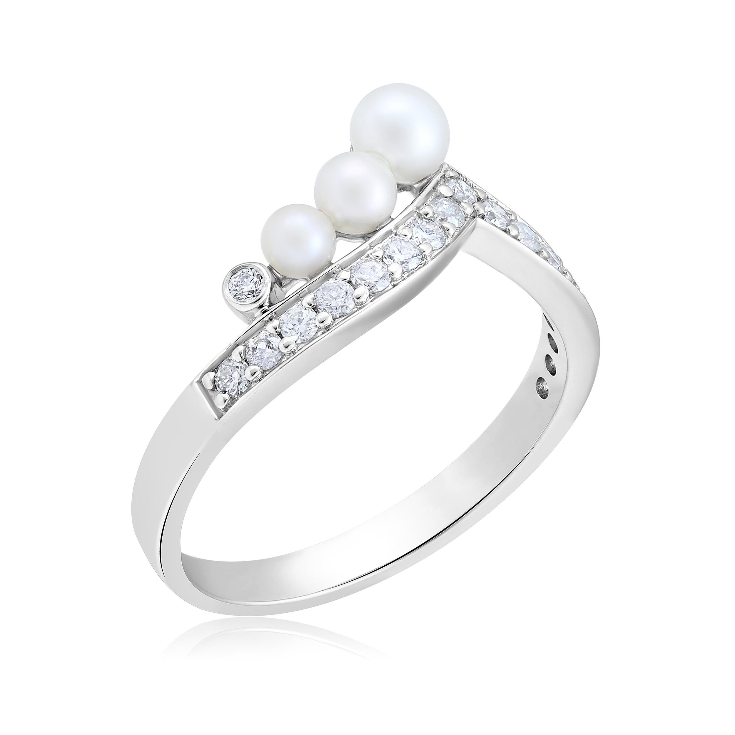 Ring Size: US 8 

Crafted in 2.89 grams of 14K White Gold, the ring contains 18 stones of Round Diamonds with a total of 0.32 carat in F-G color and I1-I2 clarity combined with 3 Cultured Pearls with a total of 0.96 carat.

CONTEMPORARY AND TIMELESS