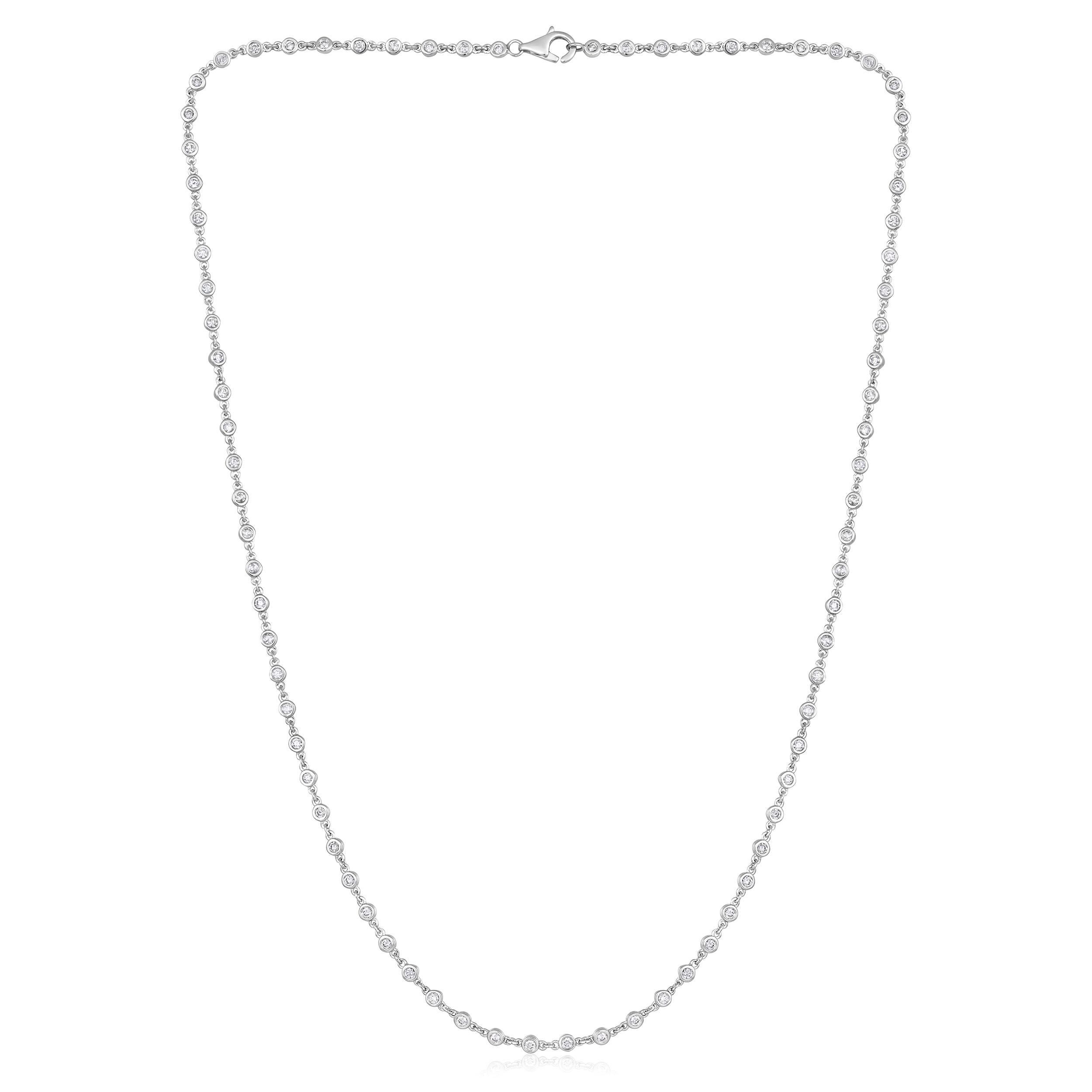 Crafted in 8.74 grams of 18K White Gold, the necklace contains 83 stones of Round Natural Diamonds with a total of 1.65 carat in G-H color and VS-SI clarity. The necklace length is 18 inches.
CONTEMPORARY AND TIMELESS ESSENCE: Crafted in