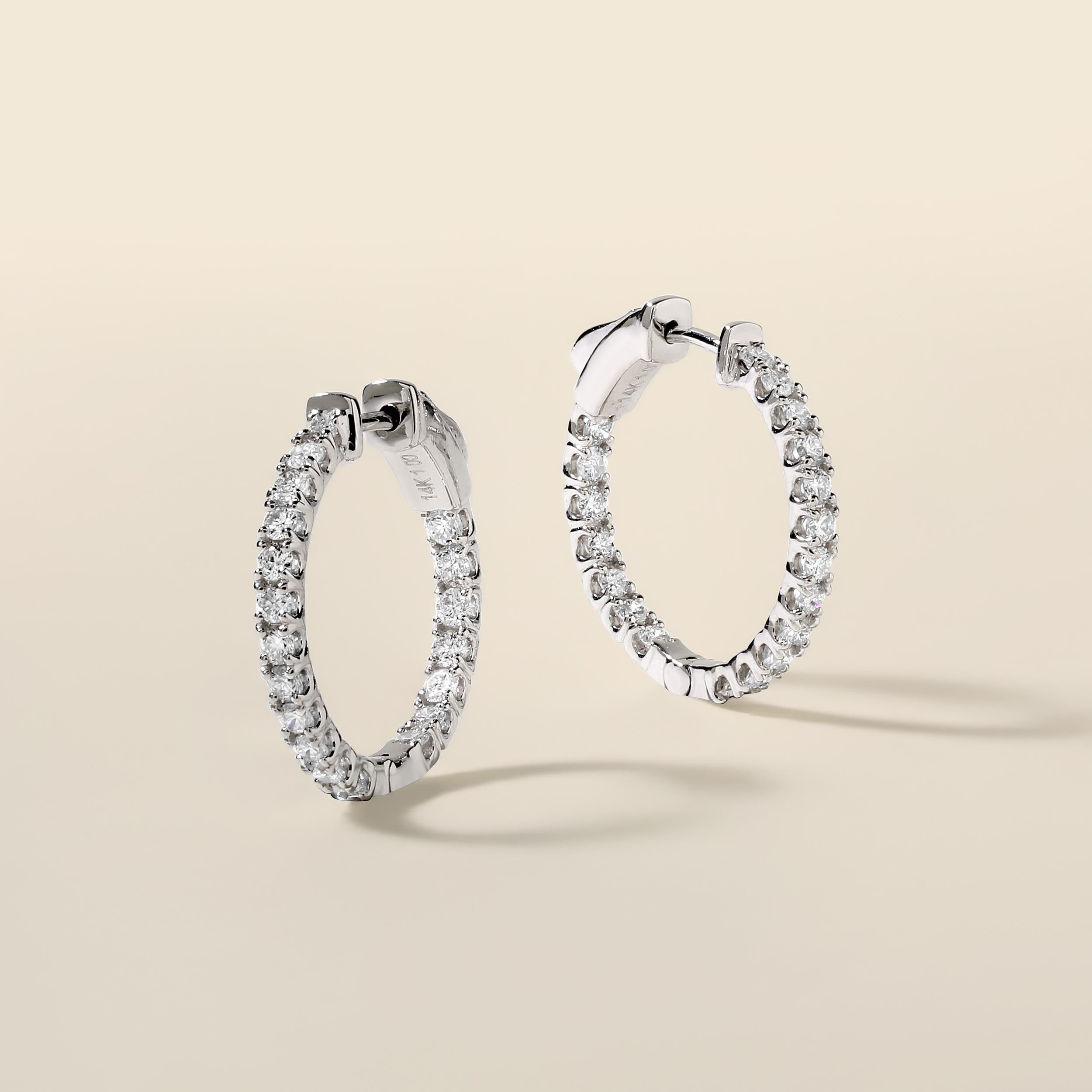 Crafted in 3.93 grams of 14K White Gold, the earrings contains 38 stones of Round Diamonds with a total of 1 carat in G-H color and SI clarity.

CONTEMPORARY AND TIMELESS ESSENCE: Crafted in 14-karat/18-karat with 100% natural diamond and designed