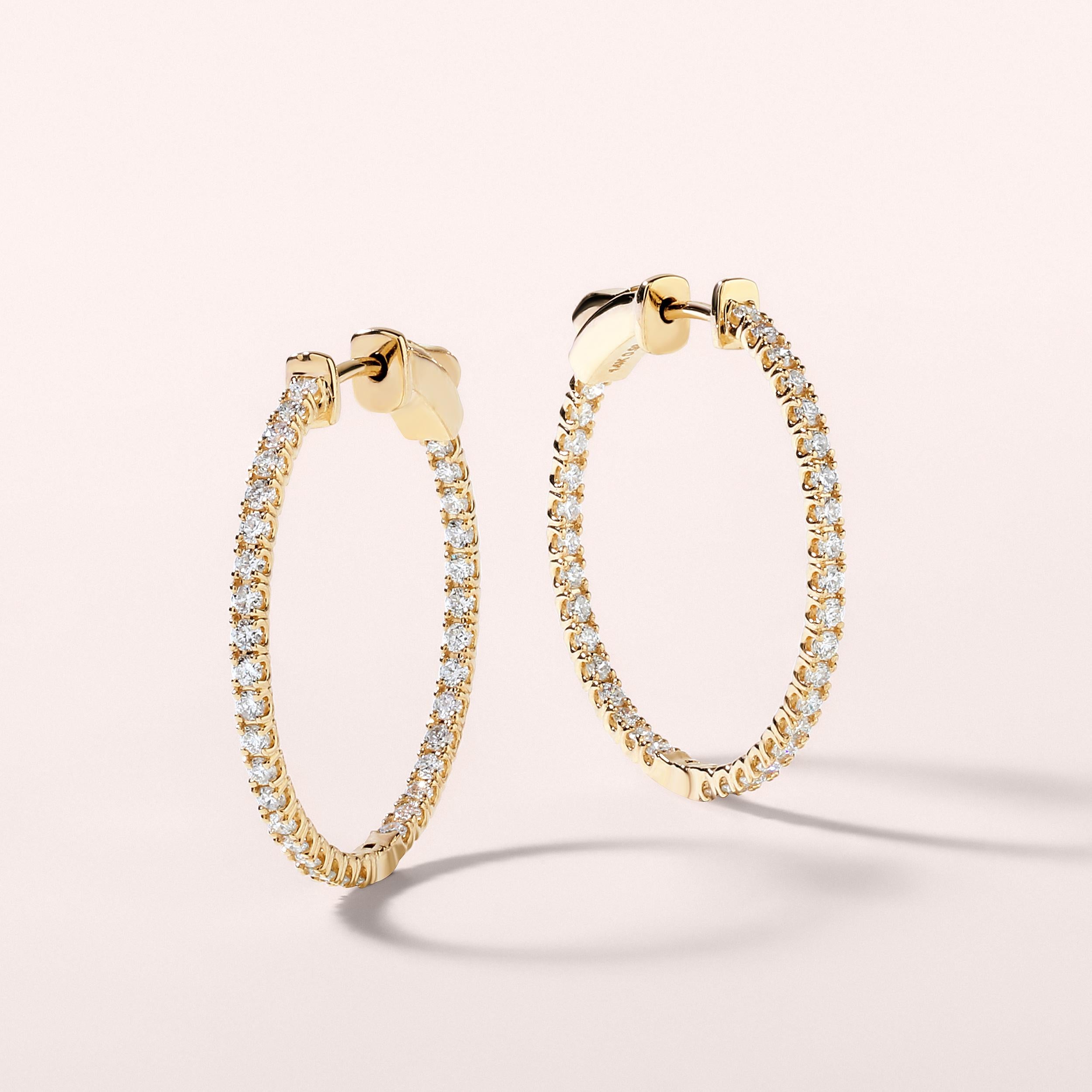 Crafted in 3.9 grams of 14K Yellow Gold, the earrings contains 68 stones of Round Diamonds with a total of 0.98 carat in G-H color and SI clarity.

CONTEMPORARY AND TIMELESS ESSENCE: Crafted in 14-karat/18-karat with 100% natural diamond and