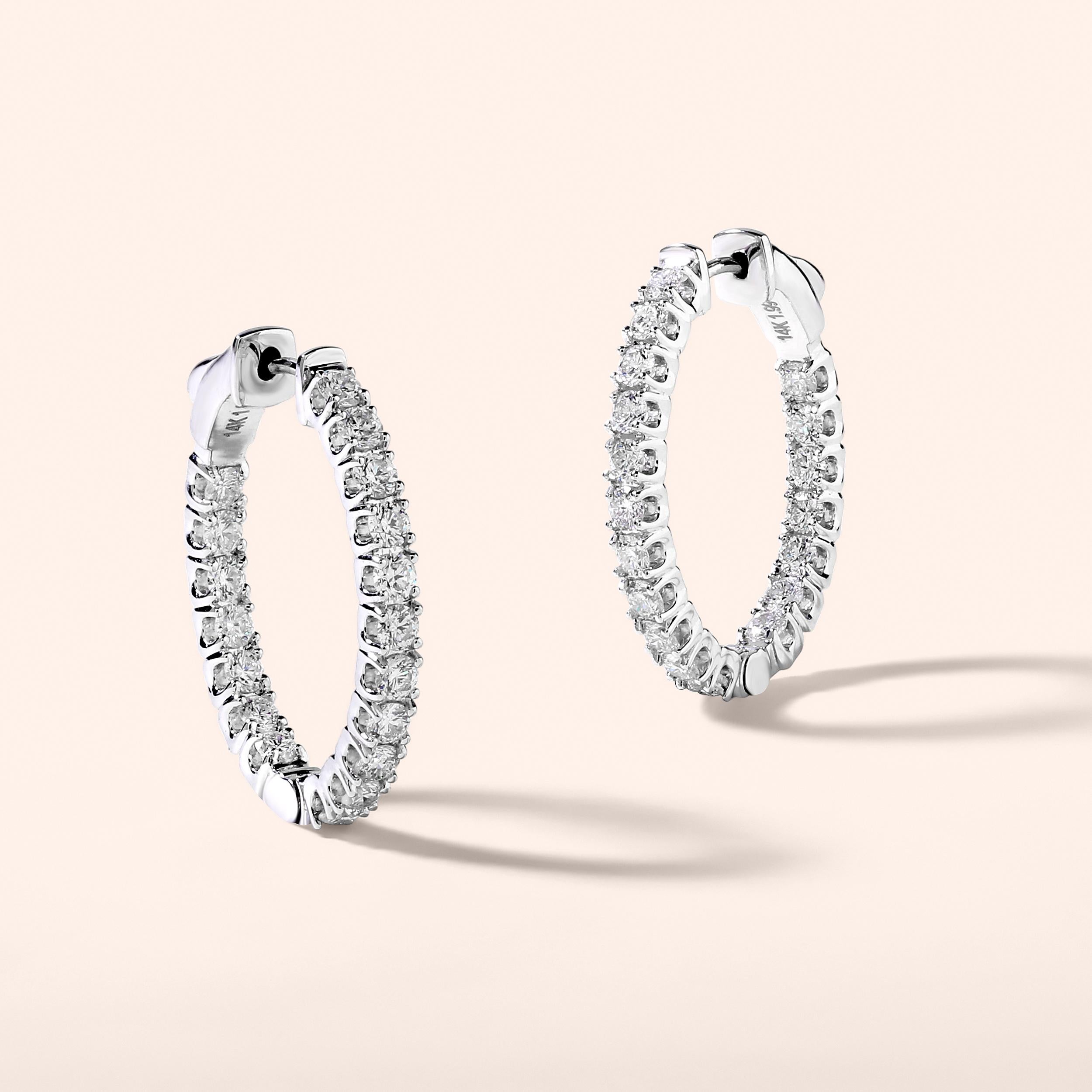 Crafted in 7.55 grams of 14K White Gold, the earrings contains 36 stones of Round Diamonds with a total of 1.99 carat in G-H color and SI clarity.

CONTEMPORARY AND TIMELESS ESSENCE: Crafted in 14-karat/18-karat with 100% natural diamond and