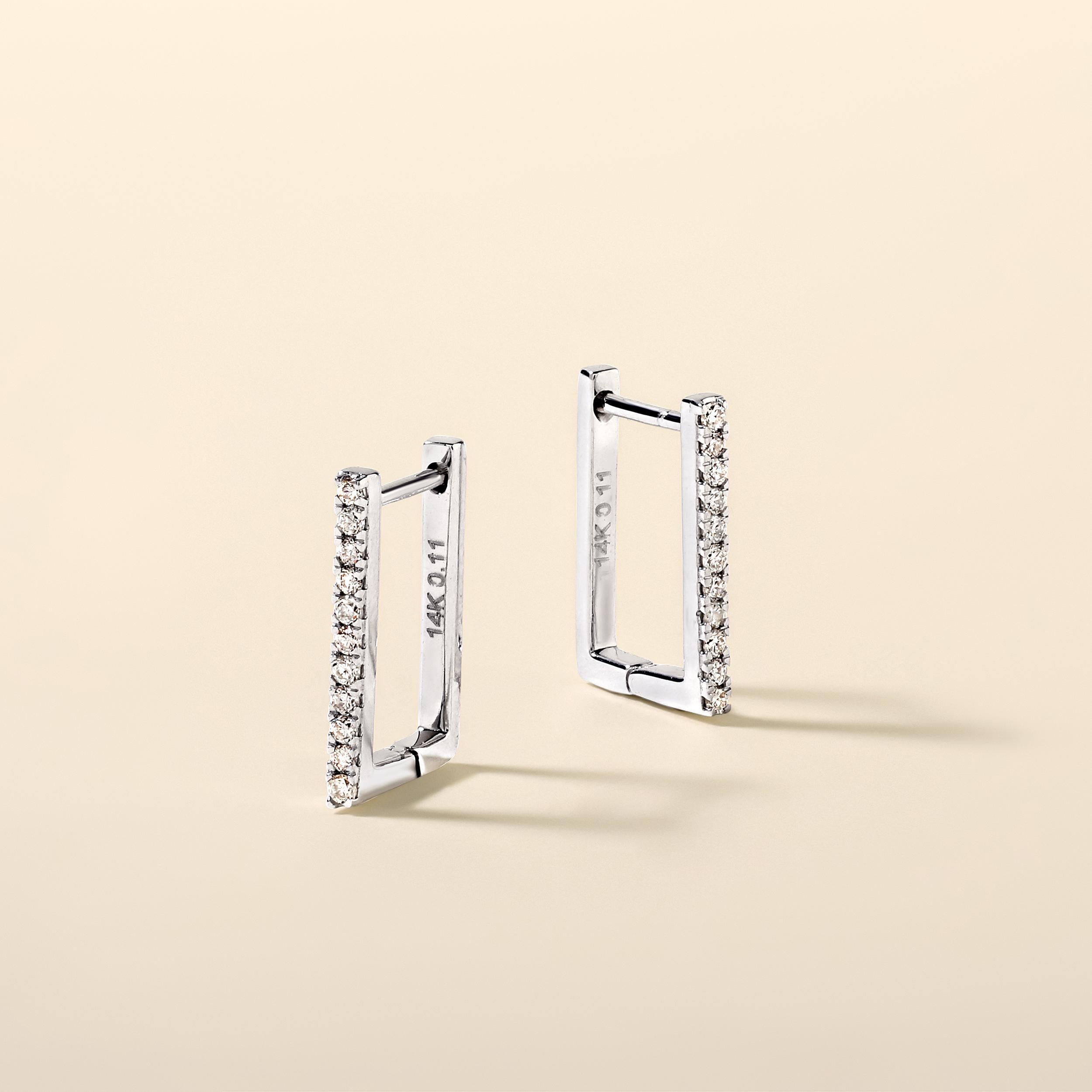 Crafted in 1.53 grams of 18K Yellow Gold, the earrings contains 18 stones of Round Diamonds with a total of 0.09 carat in E-F color and VVS clarity.

CONTEMPORARY AND TIMELESS ESSENCE: Crafted in 14-karat/18-karat with 100% natural diamond and