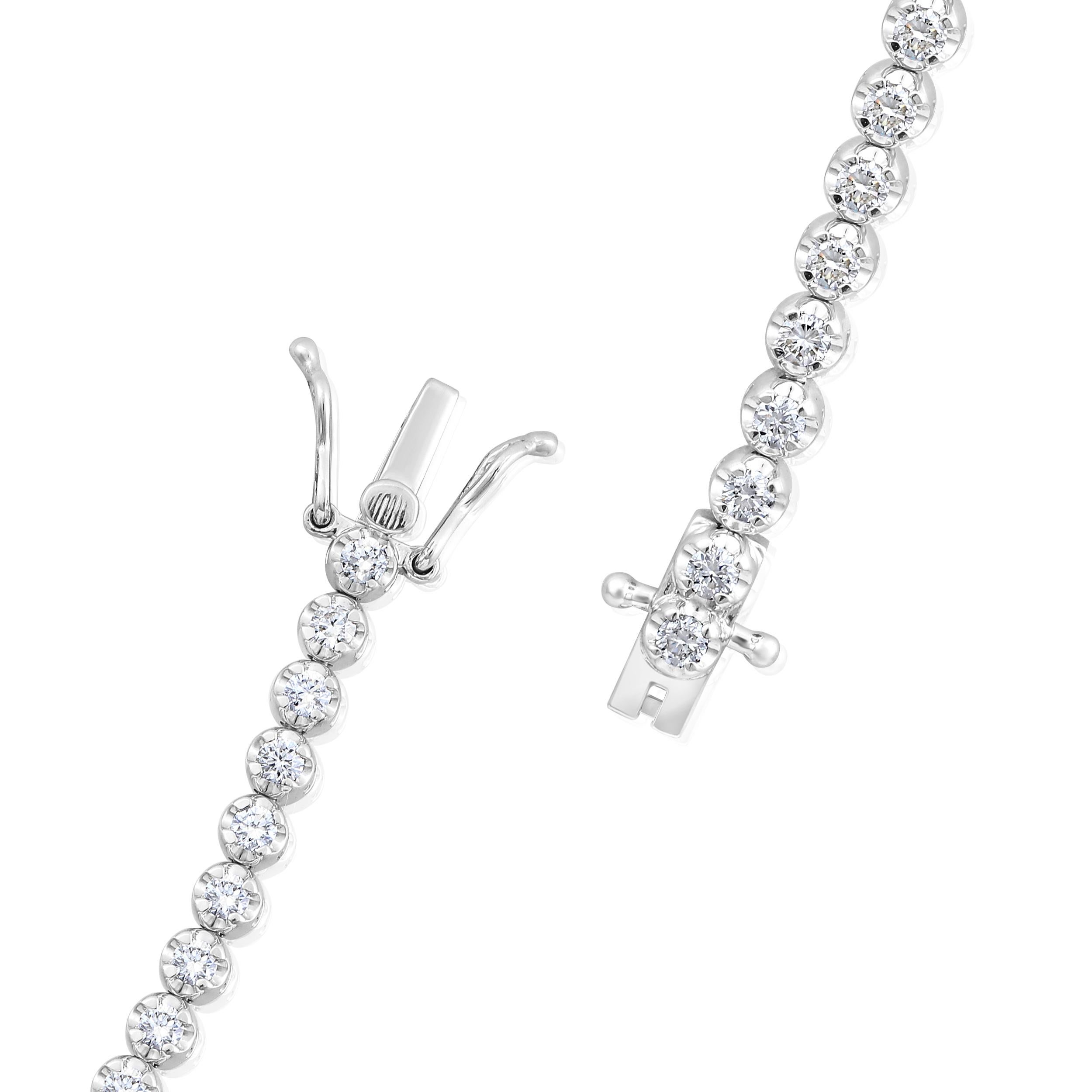 Crafted in 8.73 grams of 14K White Gold, the bracelet contains 54 stones of Round Diamonds with a total of 3.2 carat in F-G color and VS-SI carat. The bracelet length is 7 inches.

This jewelry piece will be expertly crafted by our skilled artisans