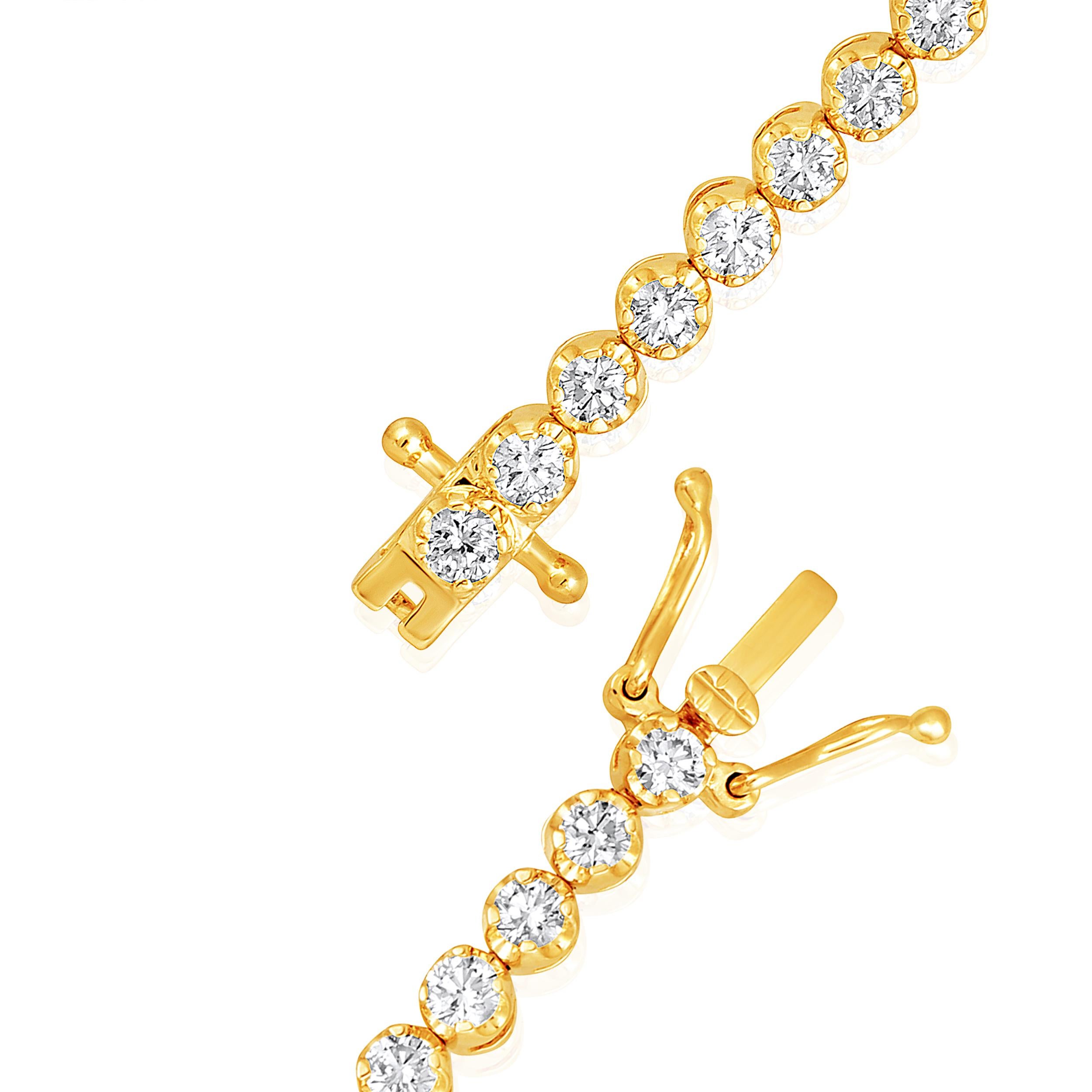 Crafted in 8.23 grams of 14K Yellow Gold, the bracelet contains 55 stones of Round Diamonds with a total of 3.03 carat in G-H color and VS-SI carat. The bracelet length is 7 inches.
This jewelry piece will be expertly crafted by our skilled artisans