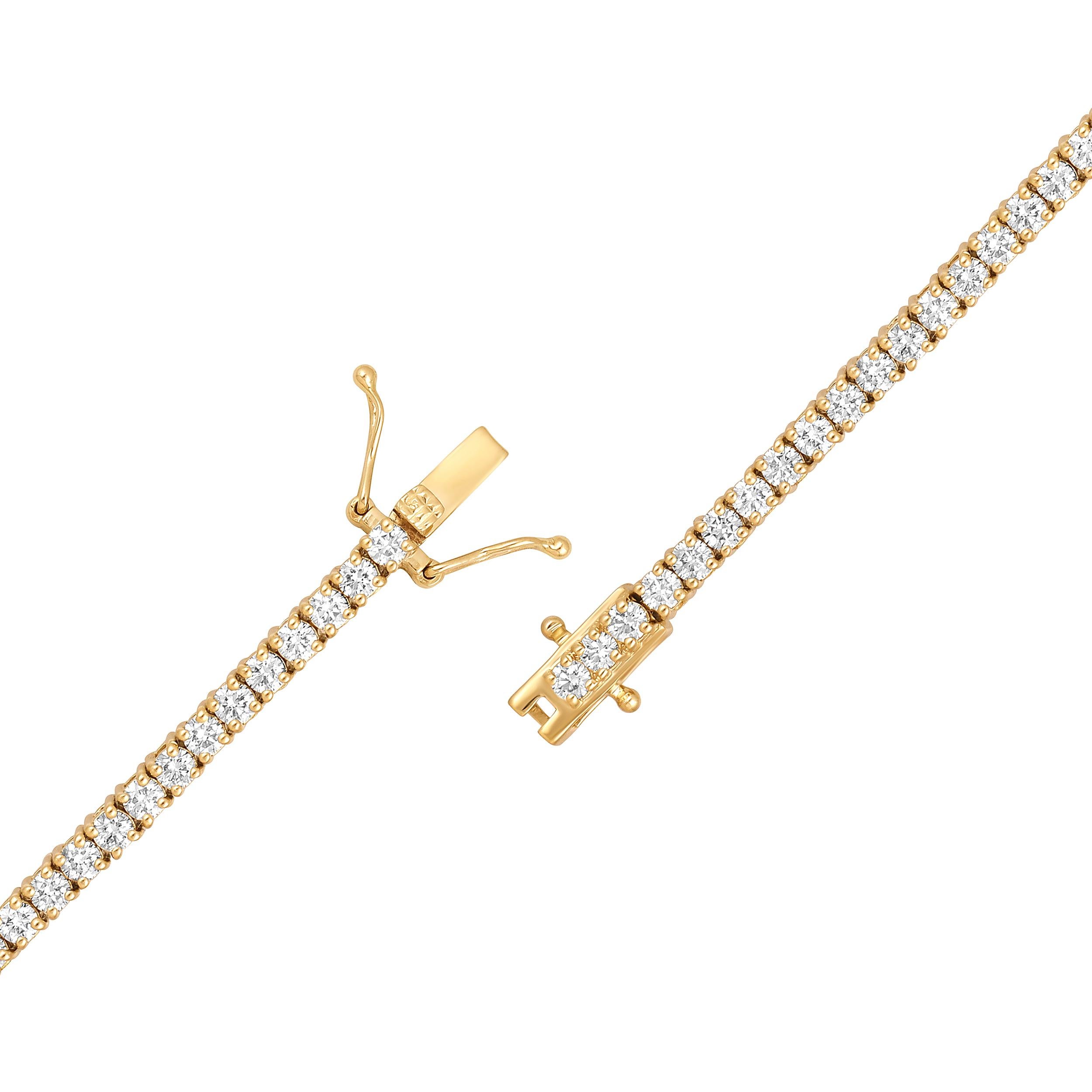 Crafted in 10.52 grams of 14K Yellow Gold, the bracelet contains 76 stones of Round Natural Diamonds with a total of 2.99 carat in G-H color and VS-SI clarity. The bracelet length is 7 inches.

CONTEMPORARY AND TIMELESS ESSENCE: Crafted in