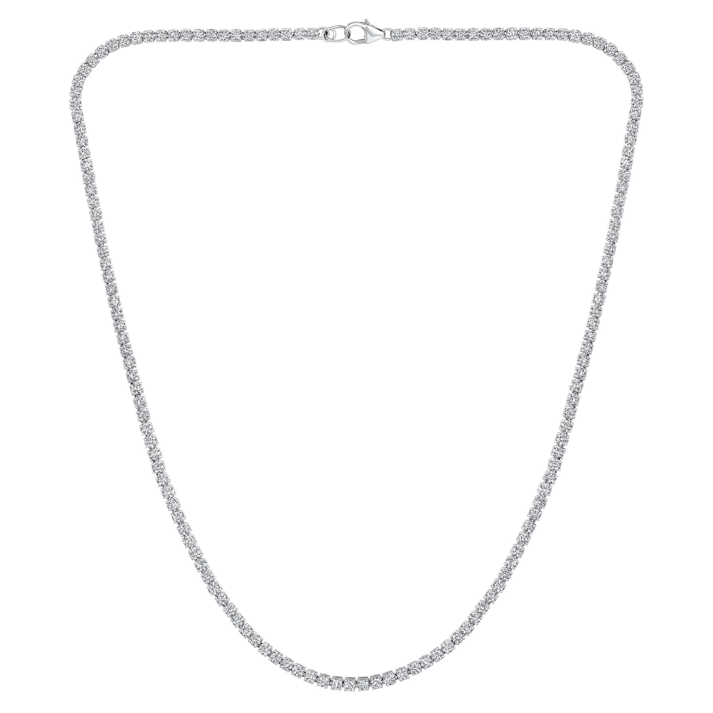 Crafted in 10.49 grams of 14K White Gold, the necklace contains 142 stones of Round Diamonds with a total of 6.09 carat in F-G color and VS-SI carat. The necklace length is 16 inches.

This jewelry piece will be expertly crafted by our skilled