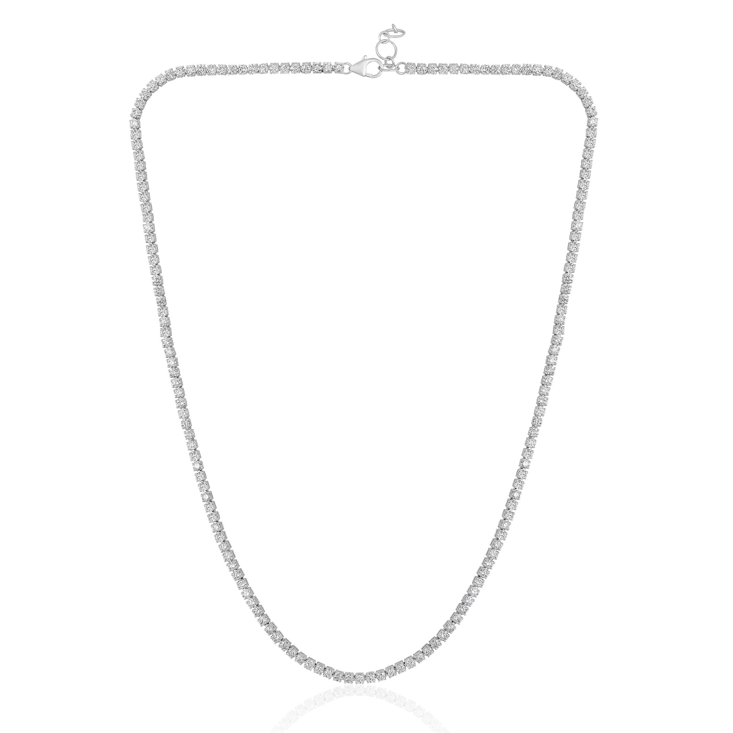 Crafted in 12.23 grams of 14K White Gold, the necklace contains 163 stones of Round Diamonds with a total of 7.13 carat in F-G color and VS-SI carat. The necklace length is 18 inches.
This jewelry piece will be expertly crafted by our skilled