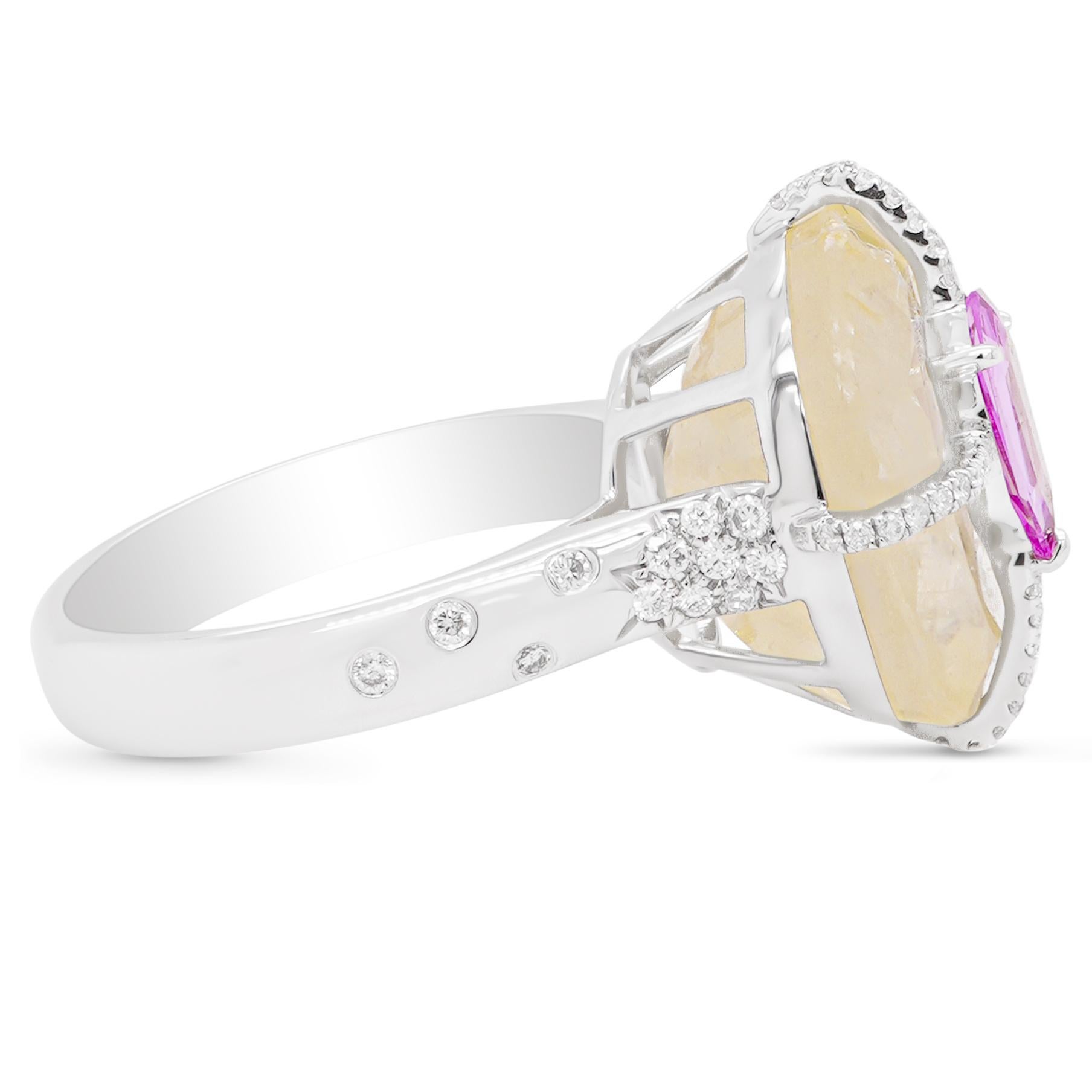 A CGL Certified yellow sapphire is mounted with 0.66 carat Kite shaped Pink Sapphire and 0.26 carat white brilliant round diamond. 