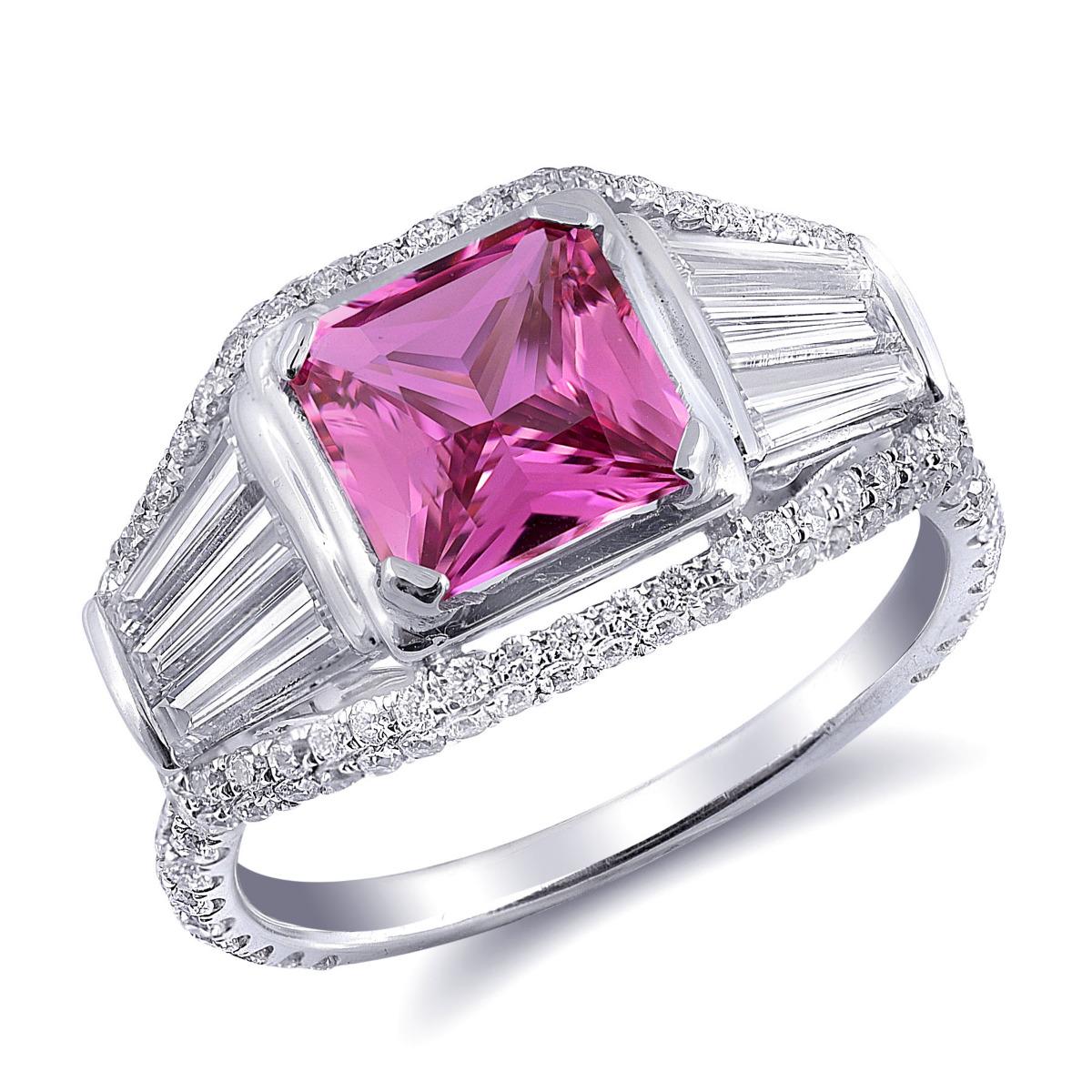 his custom-made ring is an ideal choice for a special moment, featuring a vibrant fuchsia Pink Sapphire at its center. Set within sturdy prongs, this pink sapphire is not only visually stunning but also durable enough to withstand wear and tear. The
