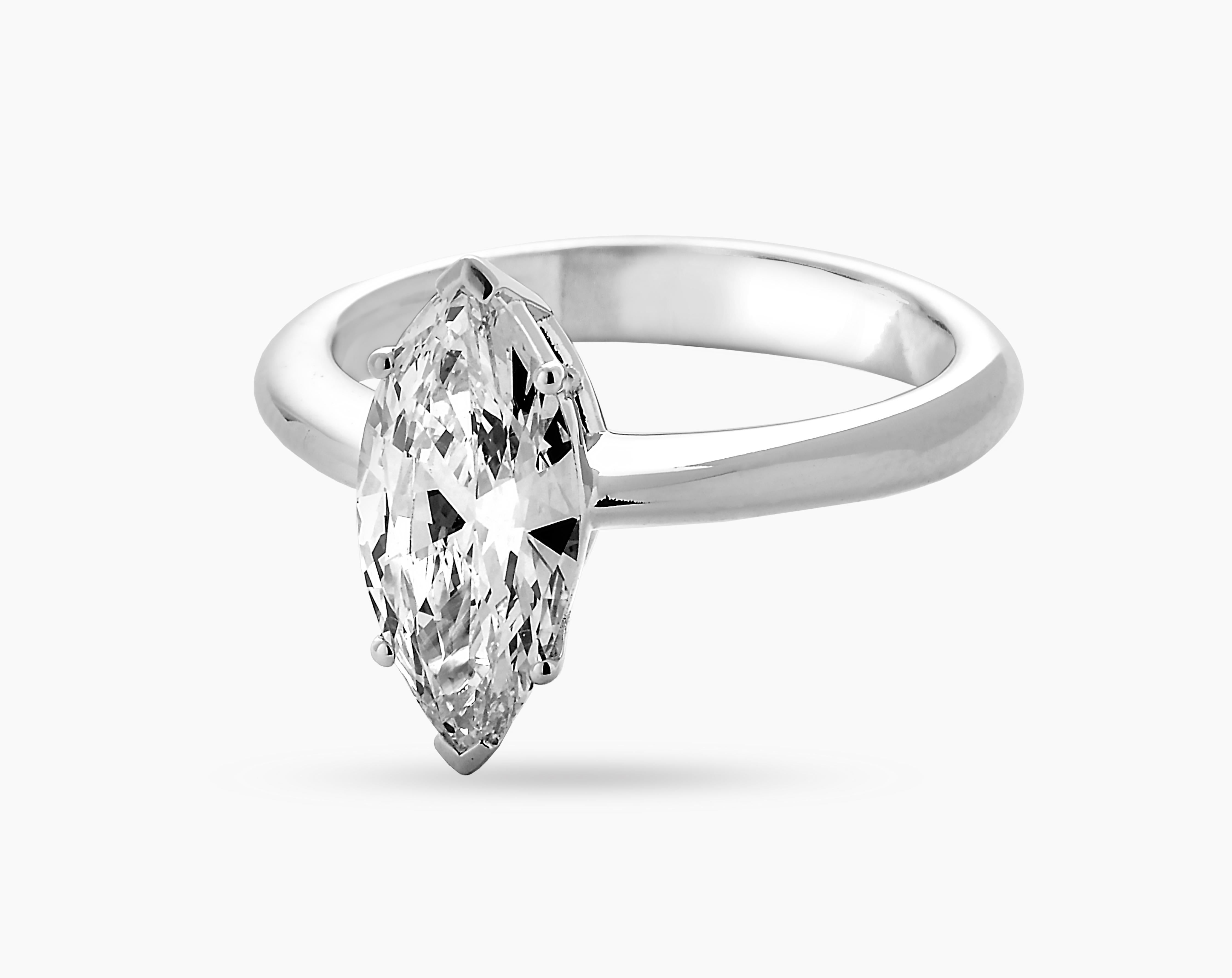 This stunning 18-karat white gold solitaire ring is set with a natural 1.62-carat diamond in marquise cut. This diamond is graded with color E, Clarity VVS2, None fluorescence. Lab report from IGI is available.
This beautiful engagement ring has a