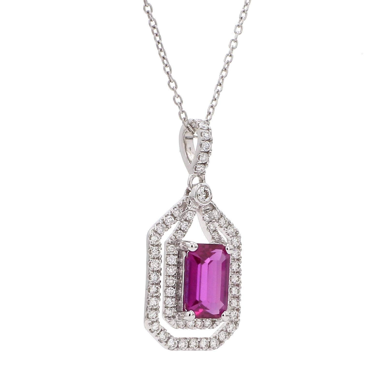 A Beautiful Handcrafted Necklace in 18 Karat White Gold with Natural & Ethically Mined Certified No Heat 1.64 Carat  Emerald Cut Pink Sapphire  in a  Halo Diamond Necklace with 18
