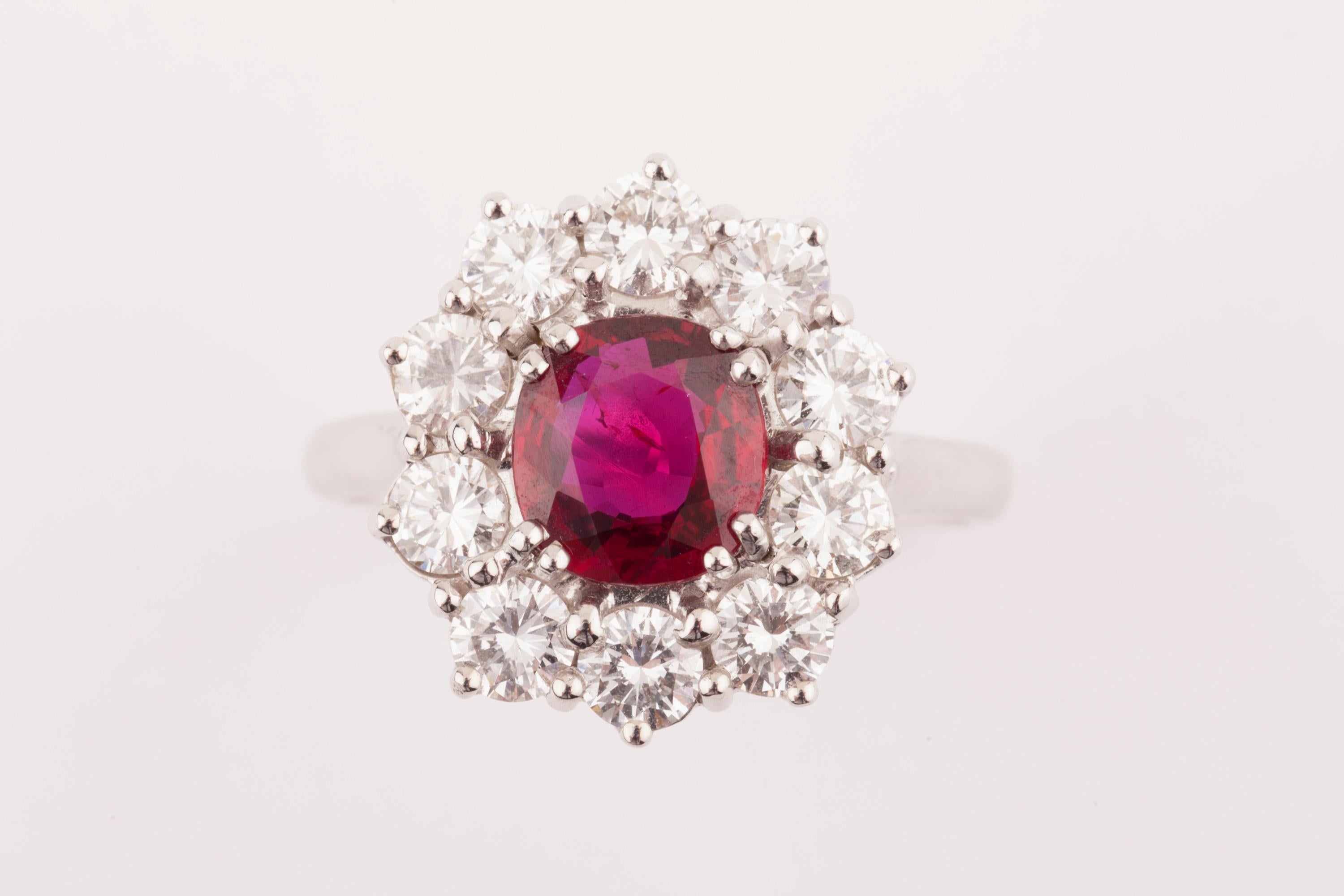 Certified 1.64 Carat Ruby and 1.50 Carats Diamonds French Ring

Very beautiful Natural Ruby Ring. The ruby is certified no heat, no treatment.  From Mozambique. The ruby weights 1.64 carats. 
The ring is hand made by my french jeweller, in gold 18K,