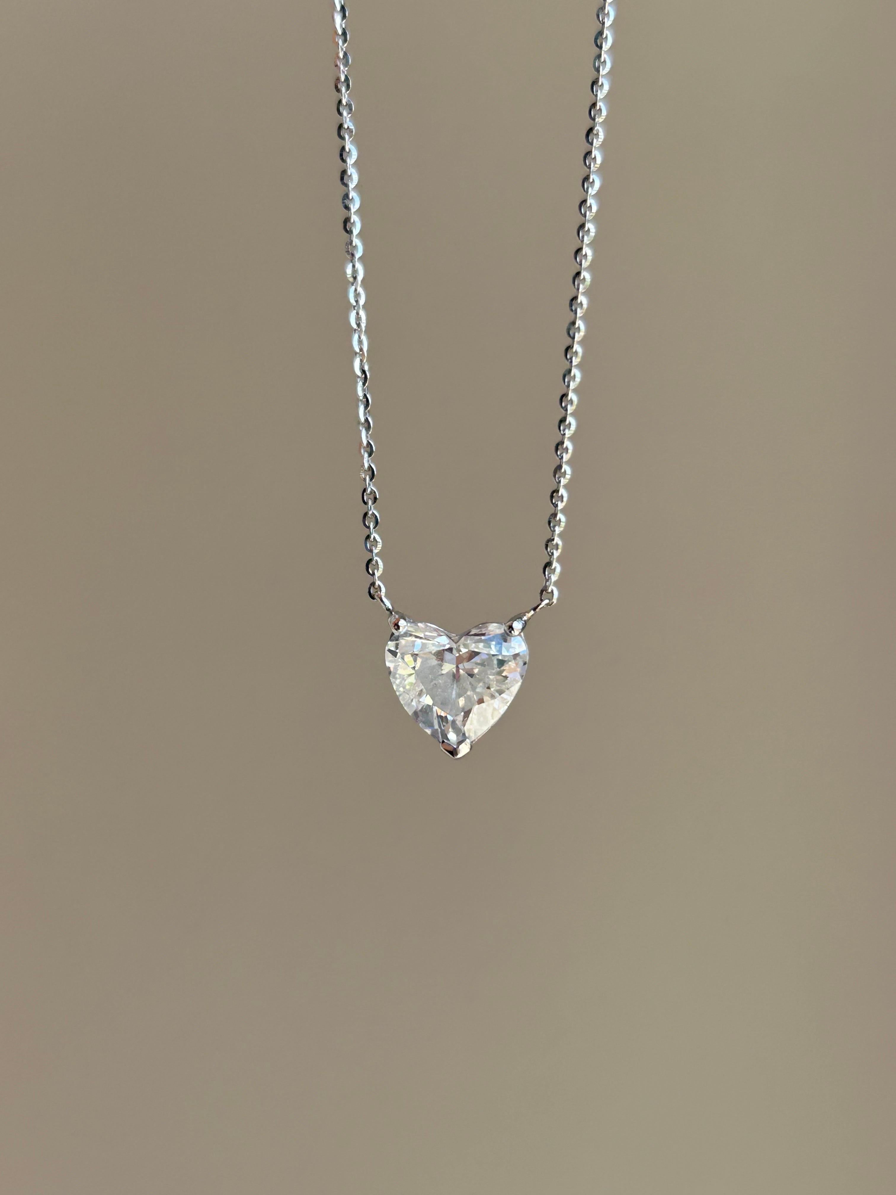 A classic solitaire pendant necklace, with a perfectly cut 1.66 carat heart shape White Diamond, HRD certified, G color, SI2 clarity. The inclusion is minor, and not on the table - making the heart shape diamond look shiny, and the perfectly cut