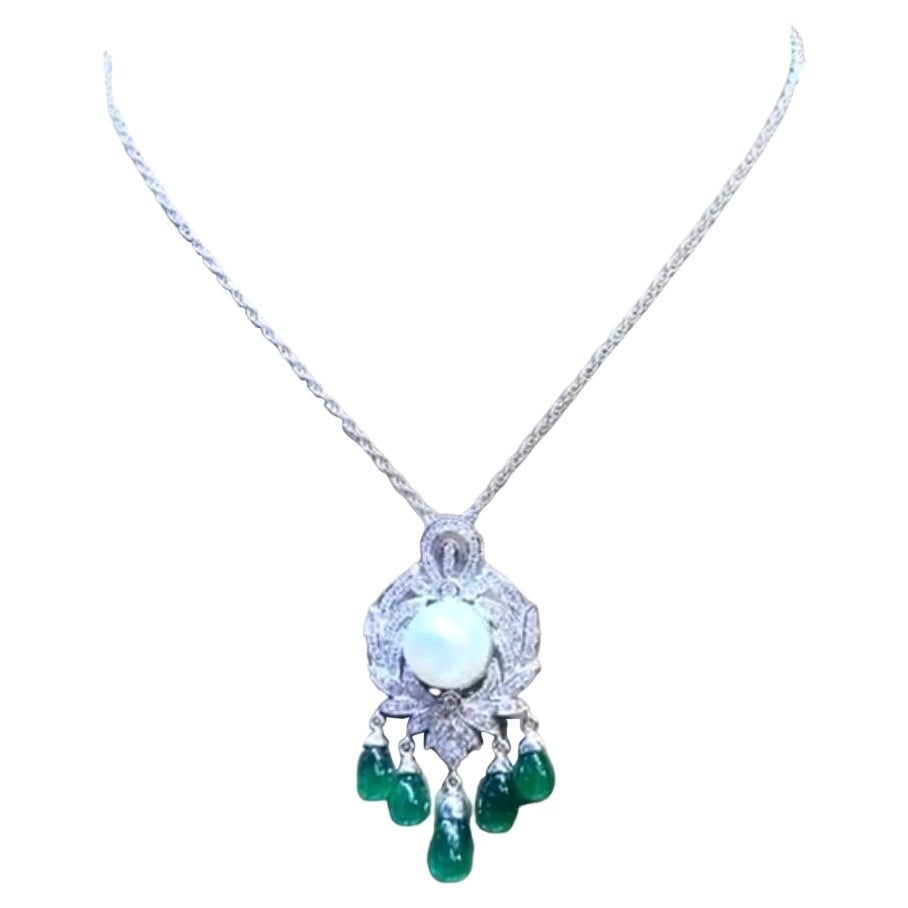 Certified 17..30 Ct of Zambia Emeralds, Diamonds and South Sea Pearl on Pendant For Sale