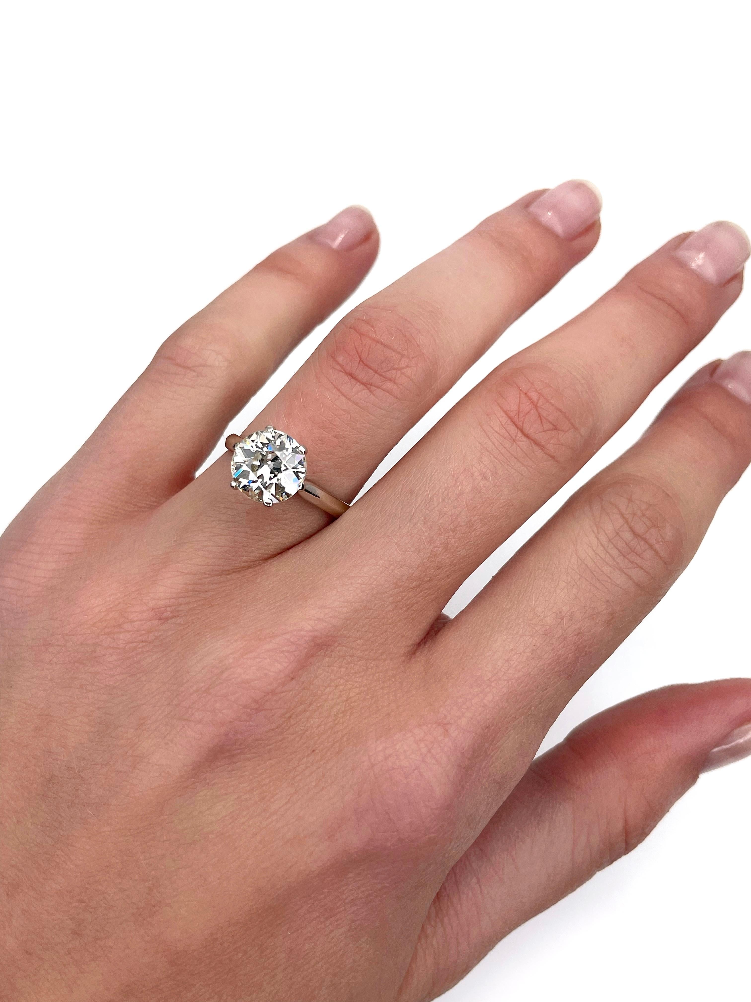 This is a magnificent engagement ring crafted in 18K white gold. The piece is certified by Assay Office with a gemstone testing report (can be found in photo gallery).

The ring features a natural diamond. Main characteristics:
- shape and cut:
