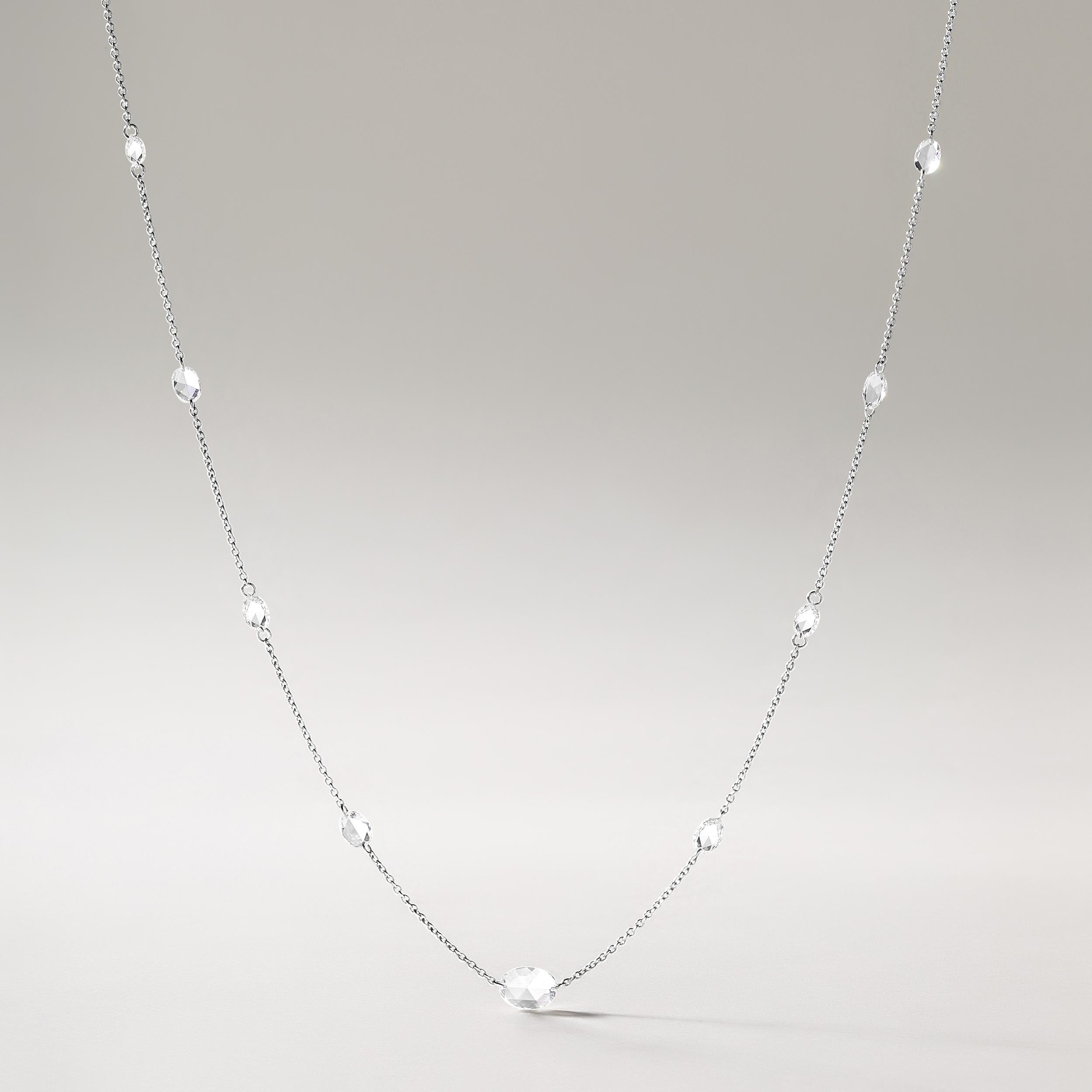 Crafted in 1.94 grams of 18K White Gold, the necklace contains 16 stones of Oval Shaped Rose Cut Natural Natural Diamonds with a total of 1.65 carat in E-F color and VVS-VS clarity. The necklace length is 18 inches.
This jewelry piece will be