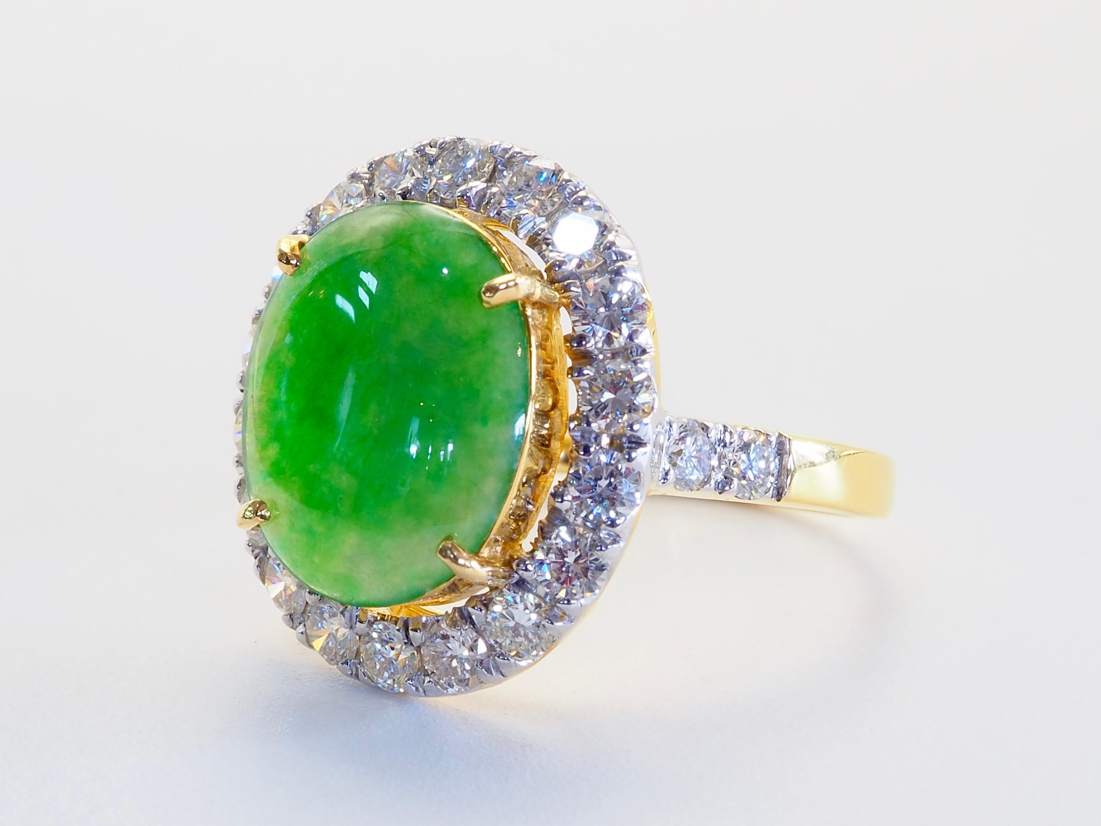  This amazing halo statement ring has a star which is the certified Jadeite from Myanmar. The jadeite has a little milky texture but has luminosity typical to Myanmar and is untreated. The brilliant cut diamonds surrounding the green gemstone are