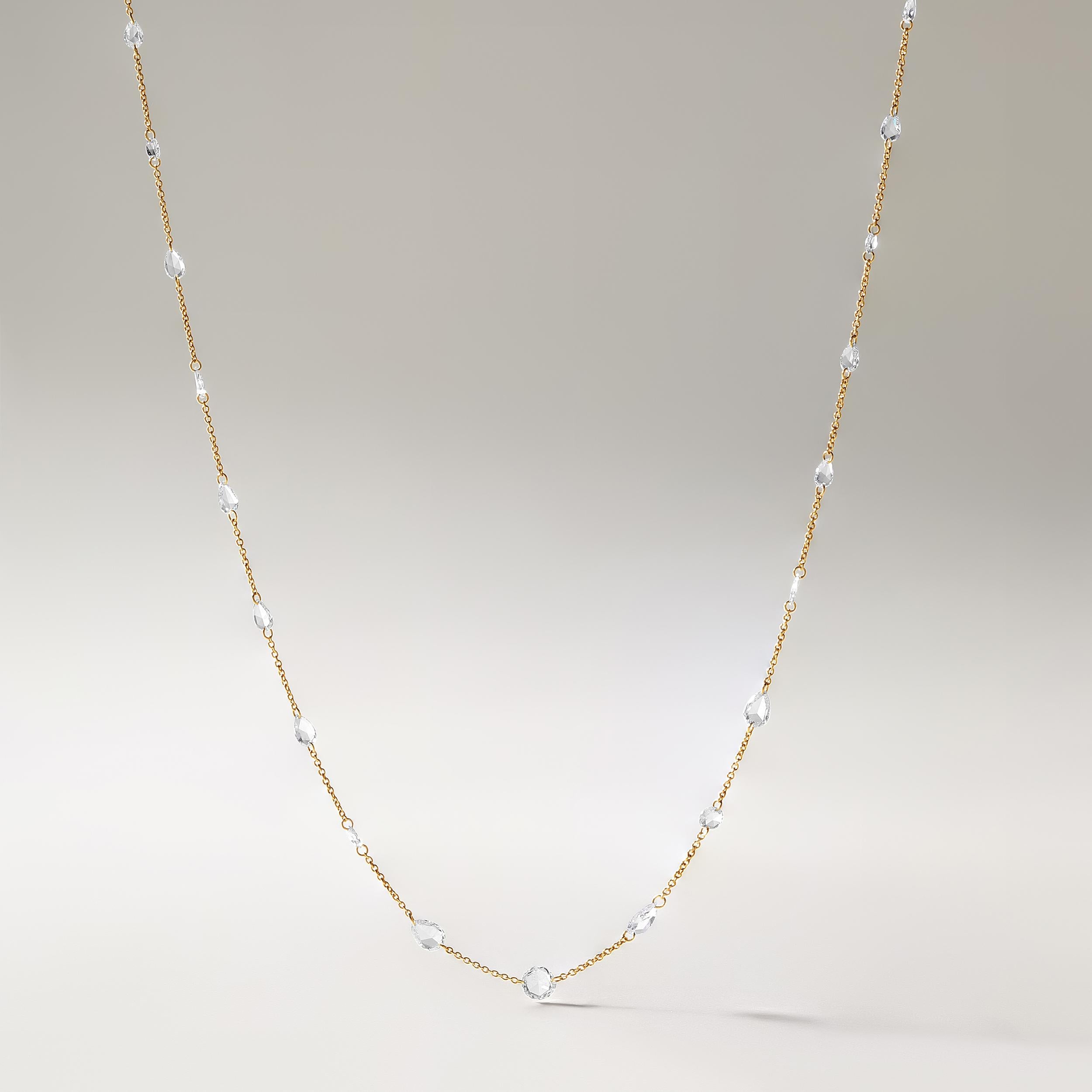 Crafted in 2 grams of 18K Yellow Gold, the necklace contains 21 stones of Pear and Round Shaped Rose Cut Natural Natural Diamonds with a total of 2.58 carat in F-G color and VS clarity. The necklace length is 18 inches.
CONTEMPORARY AND TIMELESS