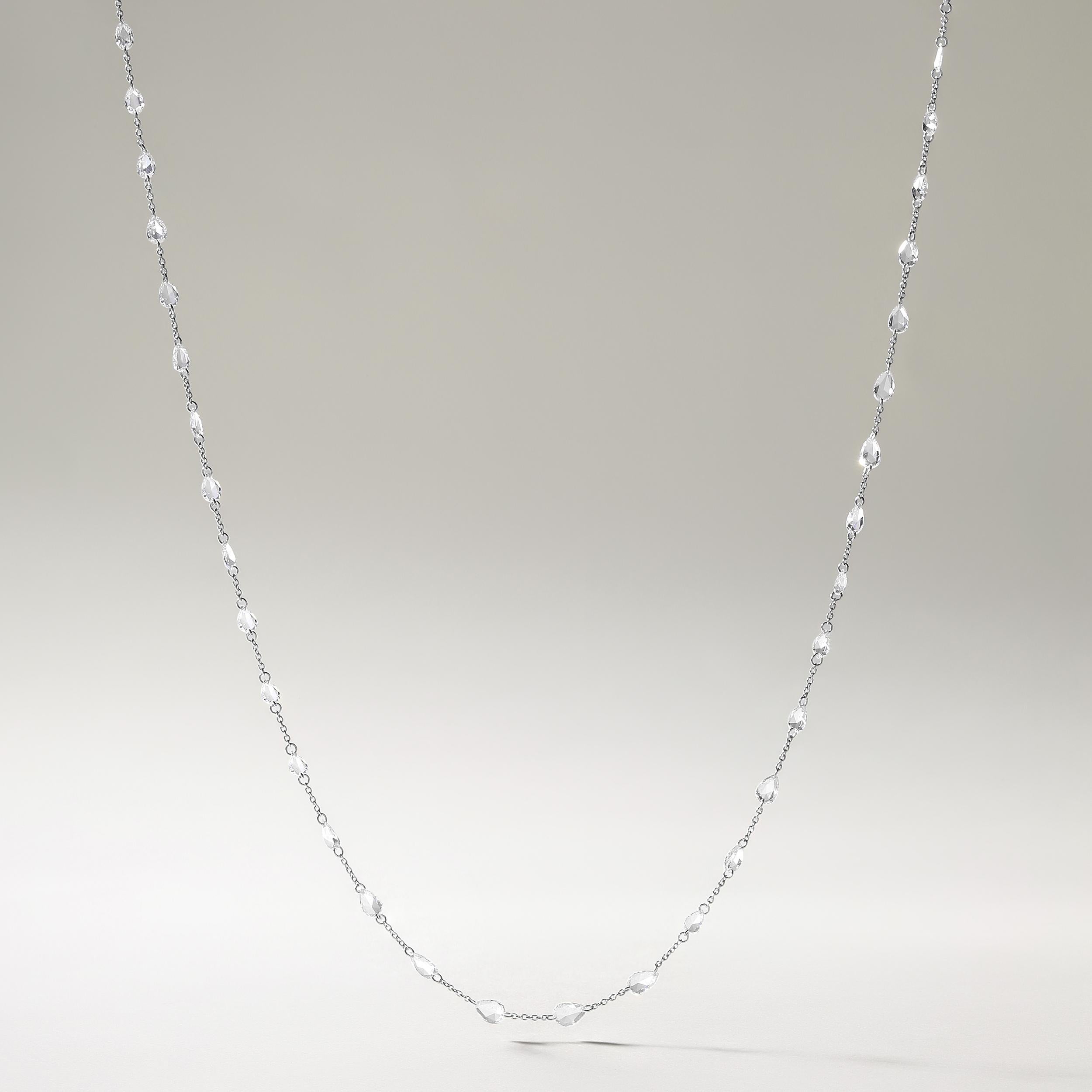 Crafted in 2.18 grams of 18K White Gold, the necklace contains 47 stones of Pear Shaped Rose Cut Natural Natural Diamonds with a total of 3.51 carat in E-F color and VVS-VS clarity. The necklace length is 18 inches.

CONTEMPORARY AND TIMELESS