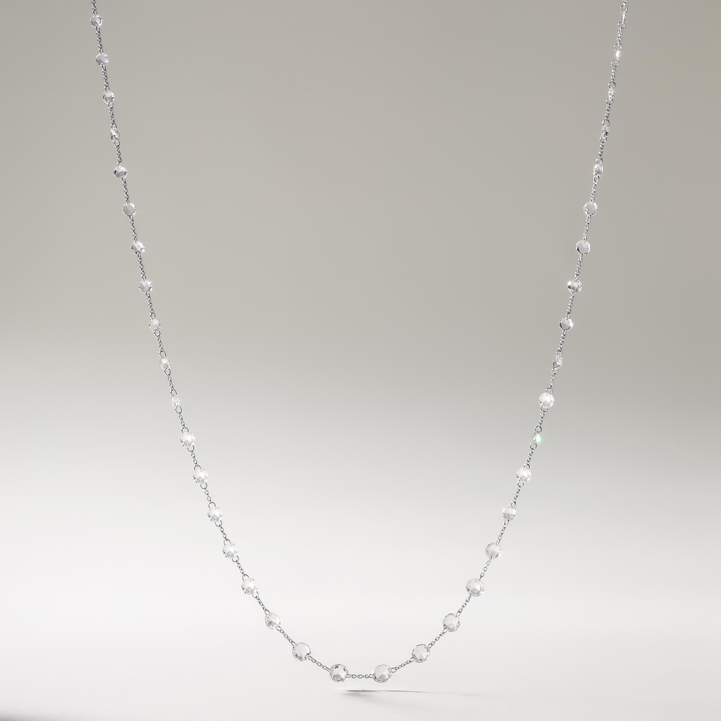 Crafted in 2.2 grams of 18K White Gold, the necklace contains 55 stones of Pear Shaped Rose Cut Natural Natural Diamonds with a total of 3.7 carat in E-F color and VVS-VS clarity. The necklace length is 18 inches.

CONTEMPORARY AND TIMELESS ESSENCE: