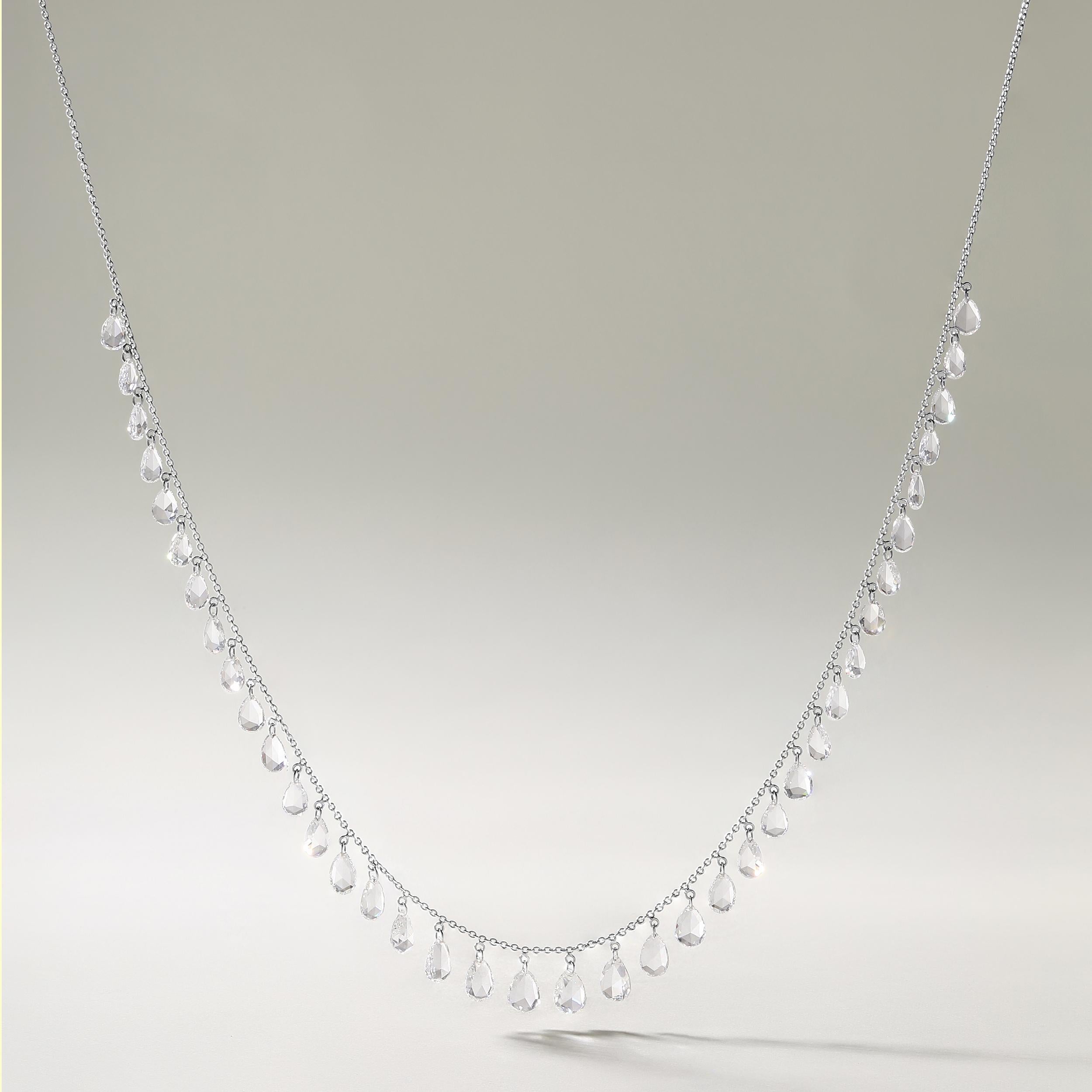 Crafted in 3.28 grams of 18K White Gold, the necklace contains 38 stones of Pear Shaped Rose Cut Natural Natural Diamonds with a total of 5.9 carat in E-F color and VVS-VS clarity. The necklace length is 18 inches.

CONTEMPORARY AND TIMELESS