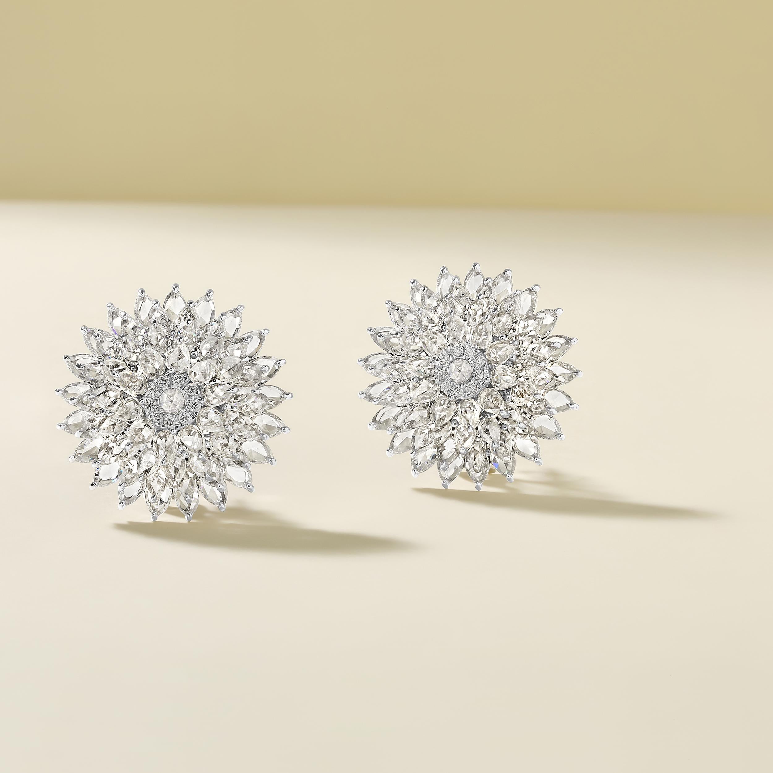 Crafted in 18.82 grams of 18K White Gold, the earrings contain 130 stones of Rose Cut Natural Diamonds with a total of 8.46 carat in E-F color and VVS-VS clarity combined with 22 stones of Round Natural Diamonds with a total of 0.18 carat in E-F