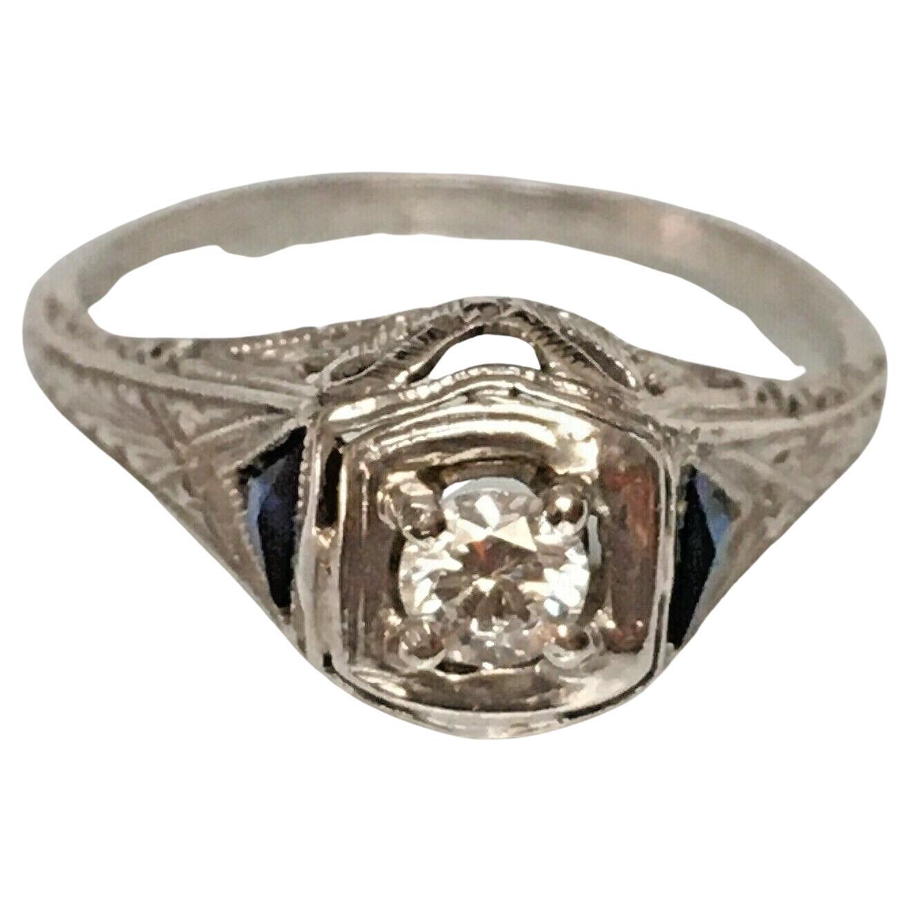 Certified 1920s Art Deco Platinum 1/6 Carat Diamond American Filigree Ring For Sale