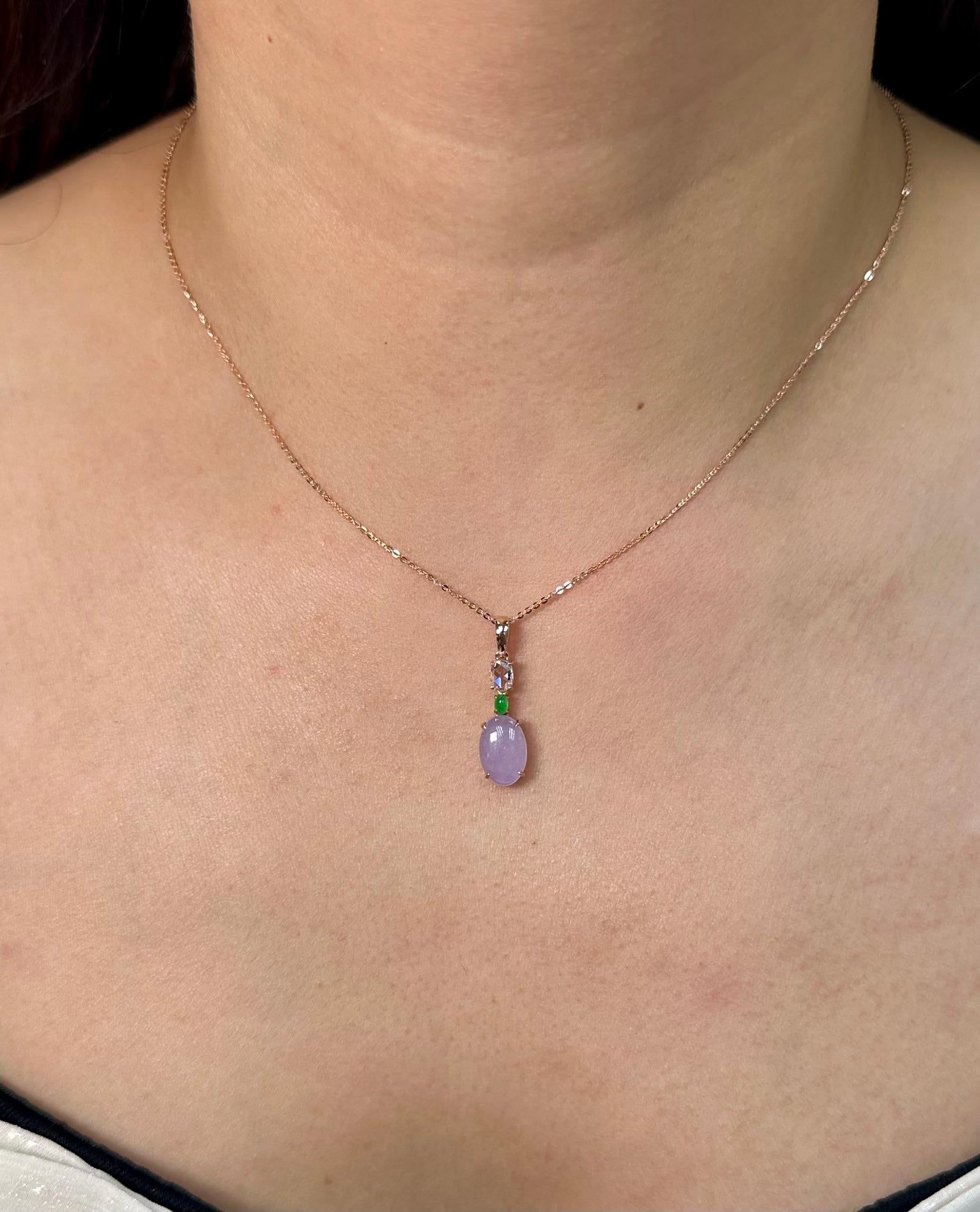 Please check out the HD video! The Jade is certified to be natural. The pendant is set in 18k rose gold with one new rose cut diamond. The new rose cut diamond weights 0.26 cts. The untreated / un-enhanced natural lavender jade is translucent. The