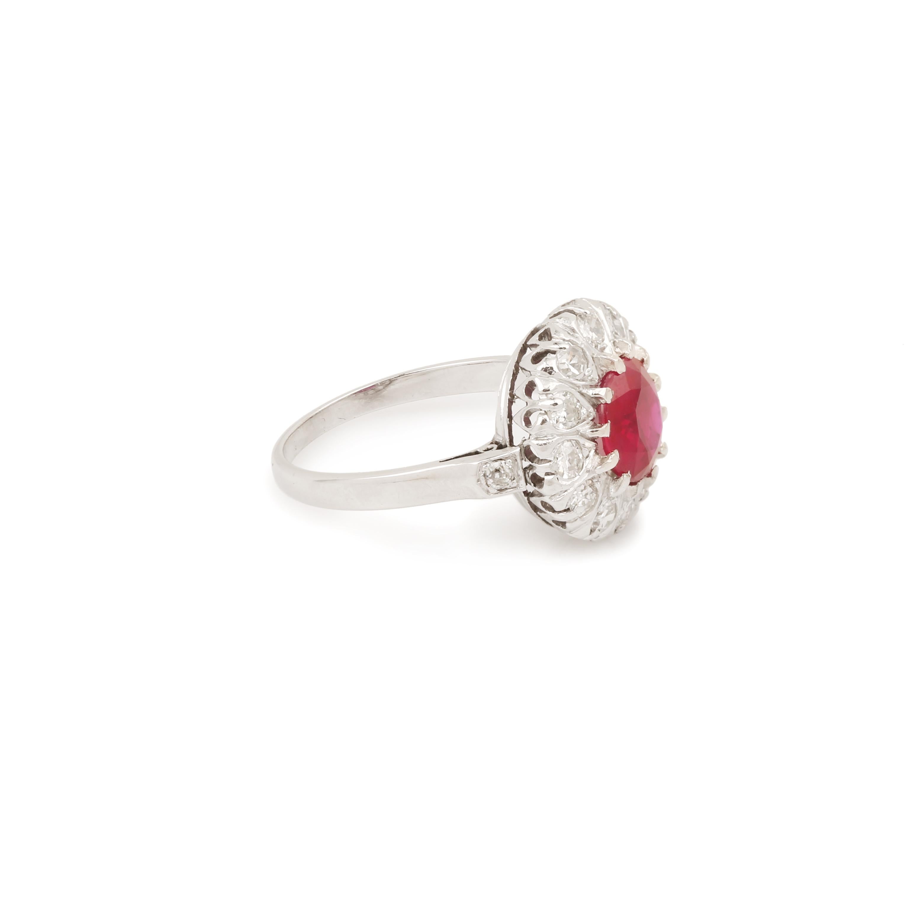 Exceptional daisy ring set in its center with a burmese ruby with a series of 12 diamonds on its outline and 2 diamonds on the shoulders.

Ruby weight: 2.08 carats

With Gem Paris certificate, specifying Natural Ruby, indication of heat treatment,