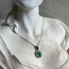 Certified 2 Carat Emerald and Diamond Halo Pendant