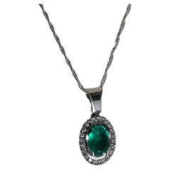 Certified 2 Carat Emerald and Diamond Halo Pendant