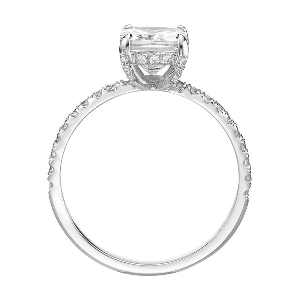 This stunning 2 ct diamond engagement ring features a spectacular 1.50 ct cushion cut diamond in the center. It is IGL certified at F-SI1 clarity enhanced, near colorless and eye clean. It gives you tremendous value! Exceptionally clear with a