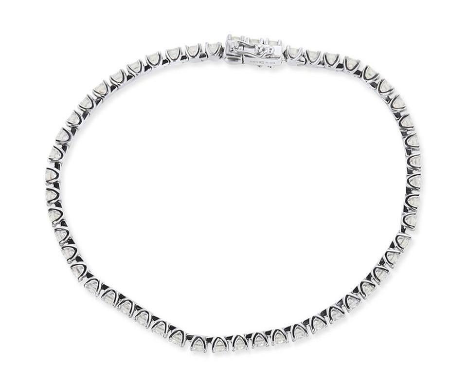 Classic 2.00 Carat Round Diamond Tennis Bracelet 2mm in 14K White Gold. Certified by IGI Lab in New York, with full diamond jewelry grading report.

2.00 Carats of Brilliant Round White VS-SI Diamonds, 
and 6.00 grams of 14K White Gold.

This is a