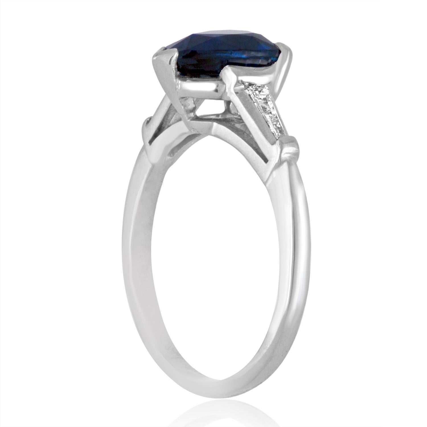 Classic Pear Shaped Ring with Baguette Side Stones
The ring is Platinum
The Center Stone is a Pear Shape Sapphire 2.01 Carats
The Sapphire is Certified By LAPIS.
The stone is heated.
There are 0.25 Carats in Diamonds F VS
The ring is a size 6.25,