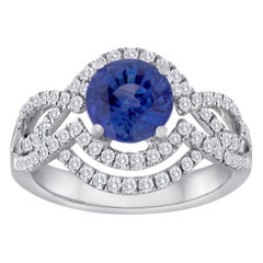Goldring mit zertifiziertem 2,01 Karat rundem blauem Saphir und Diamant-Doppel Halo