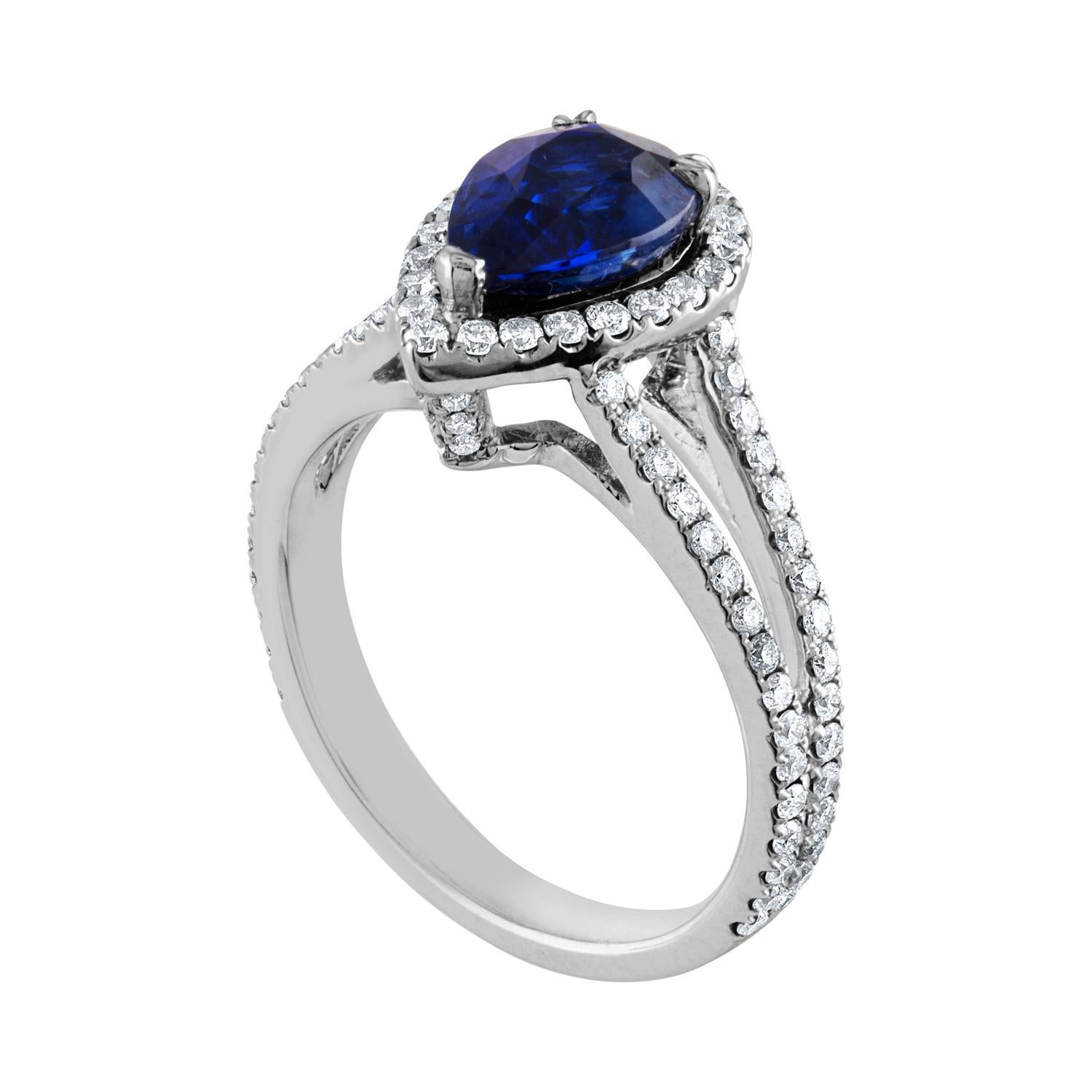 Beautiful Pear Halo Ring
The ring is 18K White Gold
The ring has 0.65 carats G SI in white diamonds.
The center stone is a pear shaped 2.02 Carat Blue Sapphire.
The Sapphire is heated and is certified by LAPIS.
The ring is a size 6.75, sizable.
The