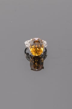 Certified 20.38 Carat Natural Yellow Zircon and Diamond Cocktail Ring
