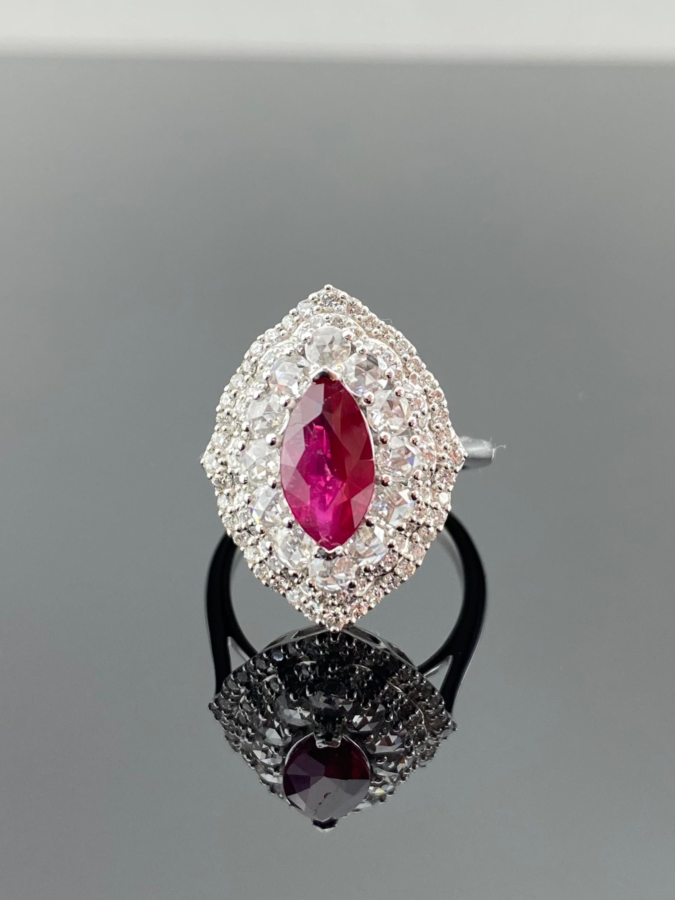 A beautiful ring set in 18K white gold featuring a single piece weighing a total of 2.05 carat of the legendary Burma Ruby and 1.28 Carats of both rosecut and brilliant cut Diamonds. Rubies are referred to as 