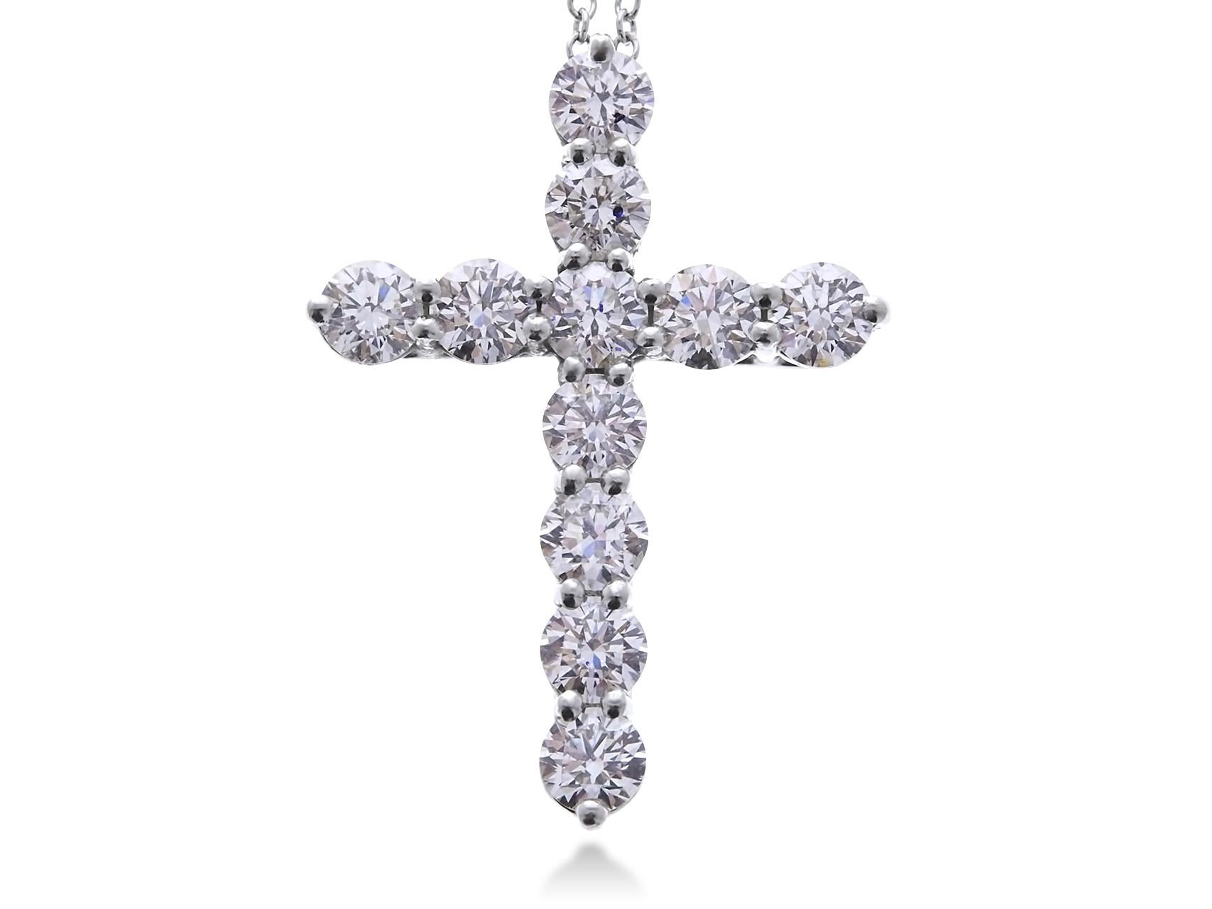 Beautiful 1.25 Carat Round Diamond Cross Pendant and Necklace in 14K White Gold. Certified by IGI Laboratory in New York, with full diamond jewelry grading report.

1.25 Carats of Brilliant Round White VS-SI Diamonds
and 4.00 grams of 14K White