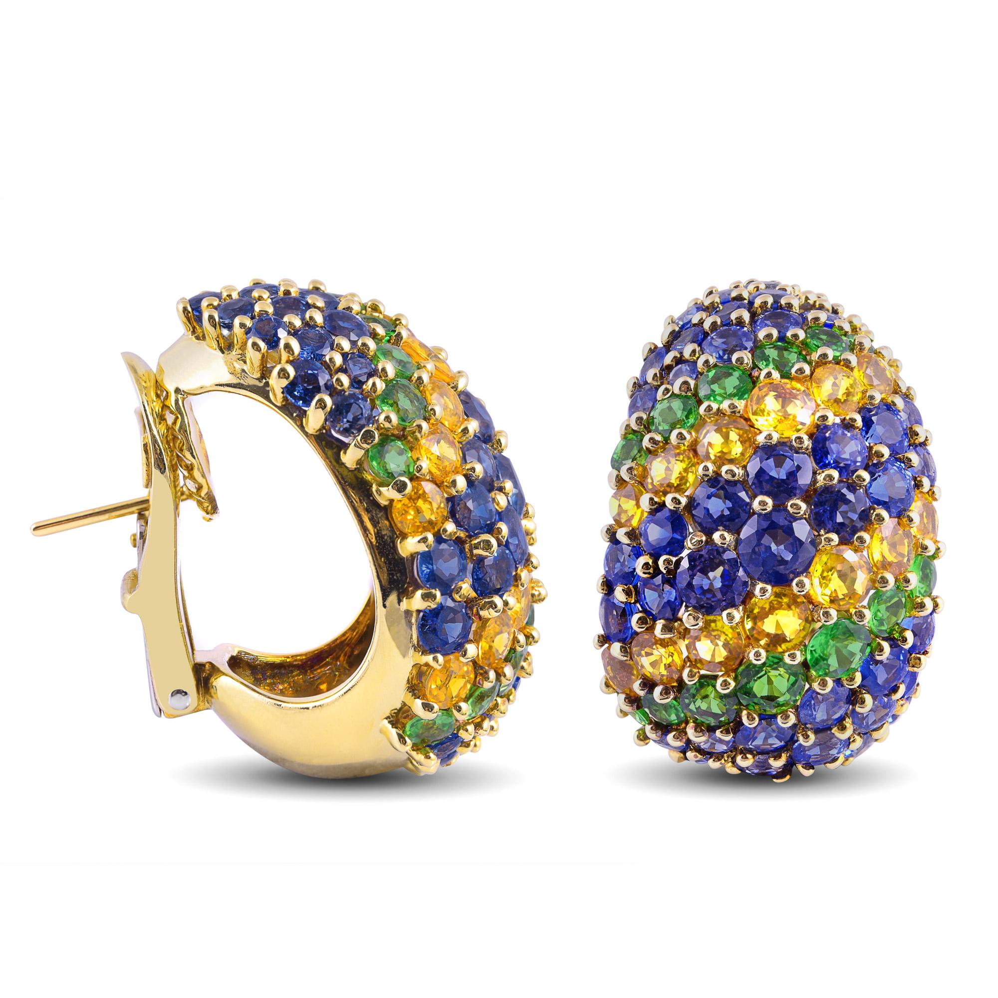 Tauchen Sie ein in ein lebendiges Farbenspiel mit diesen Ohrringen des Designers Jean Vitau, die sorgfältig aus schimmerndem 18-karätigem Gelbgold gefertigt sind. Das fantasievolle Design zeichnet sich durch blaue und gelbe Saphire im Rundschliff