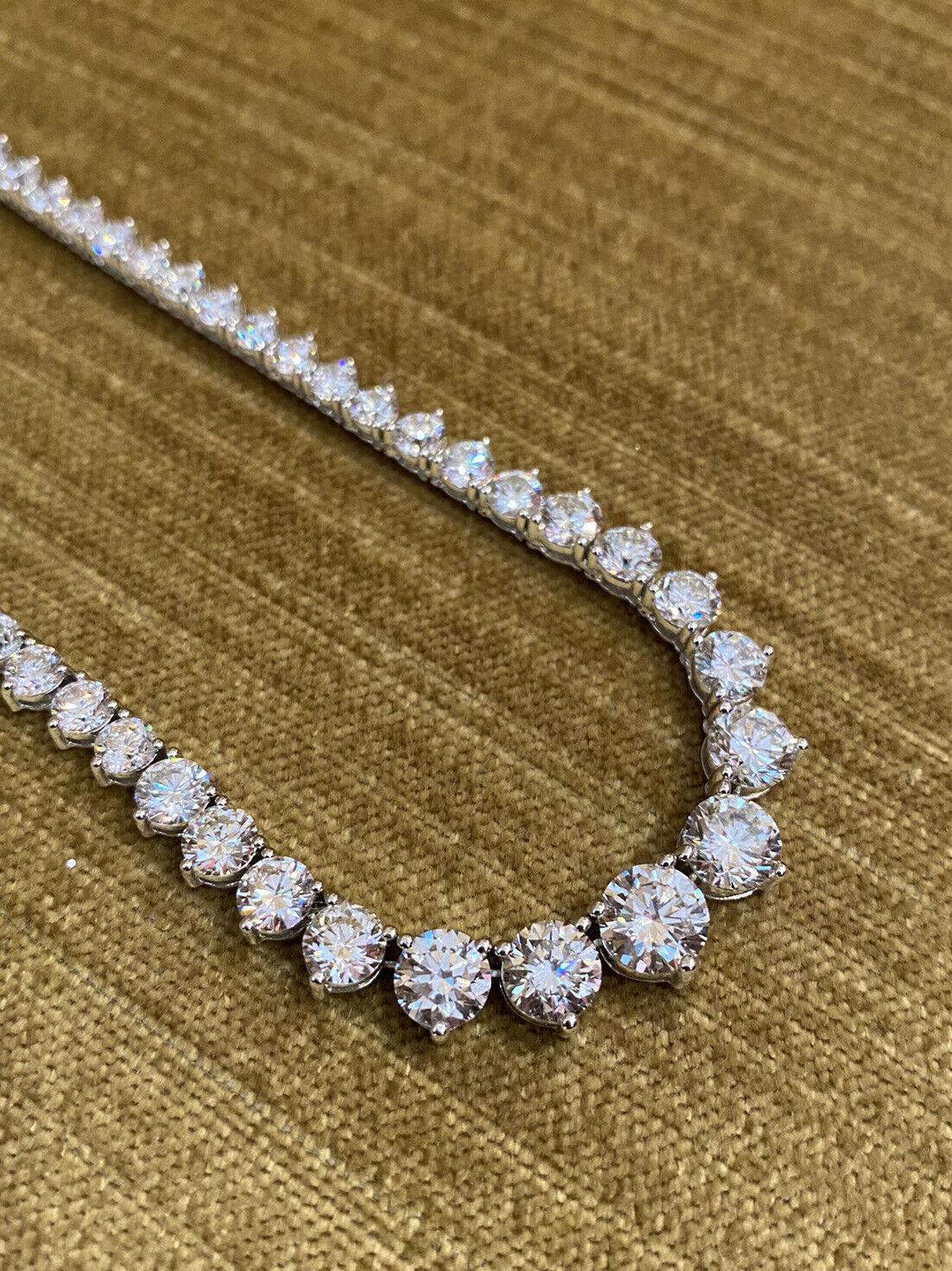 Certified Graduated Diamond Riviera Tennis Necklace 21.26 Carats Total Weight in 18k White Gold

Graduated Diamond Necklace features 88 Round Brilliant Diamonds Graduating in size prong set in 18k White Gold. The four largest diamonds come with