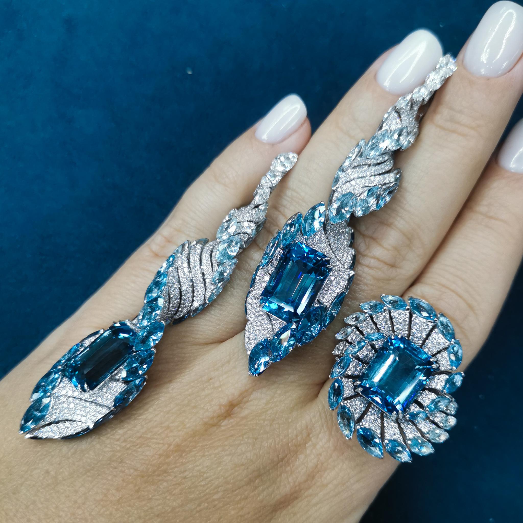 GIA Certified 21.26 Carat Santa Maria Aquamarine Diamond 18 Karat White Gold Suite
In the shape of this Suite, you probably already guessed that when they were created, our designers were inspired by the structure of human DNA. What could be more