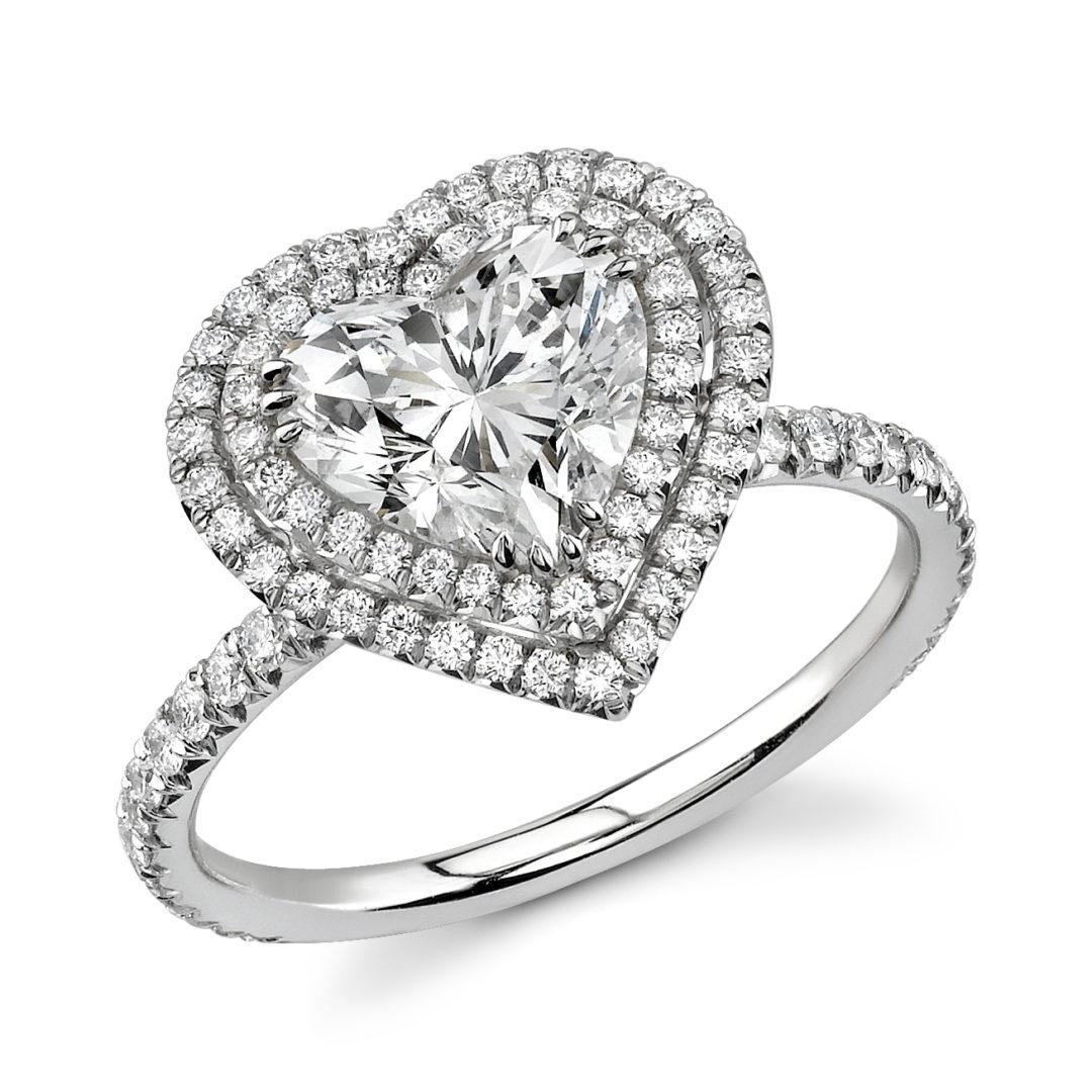 Romantic 1.61 Carat Heart Cut Diamond Double Halo Solitaire Ring in 14K White Gold. Certified by GIA Laboratory in New York, with a full diamond grading report certificate.

GIA 0.61 carat Heart Cut SI1 G Diamond center
with 1.00 carats of Round