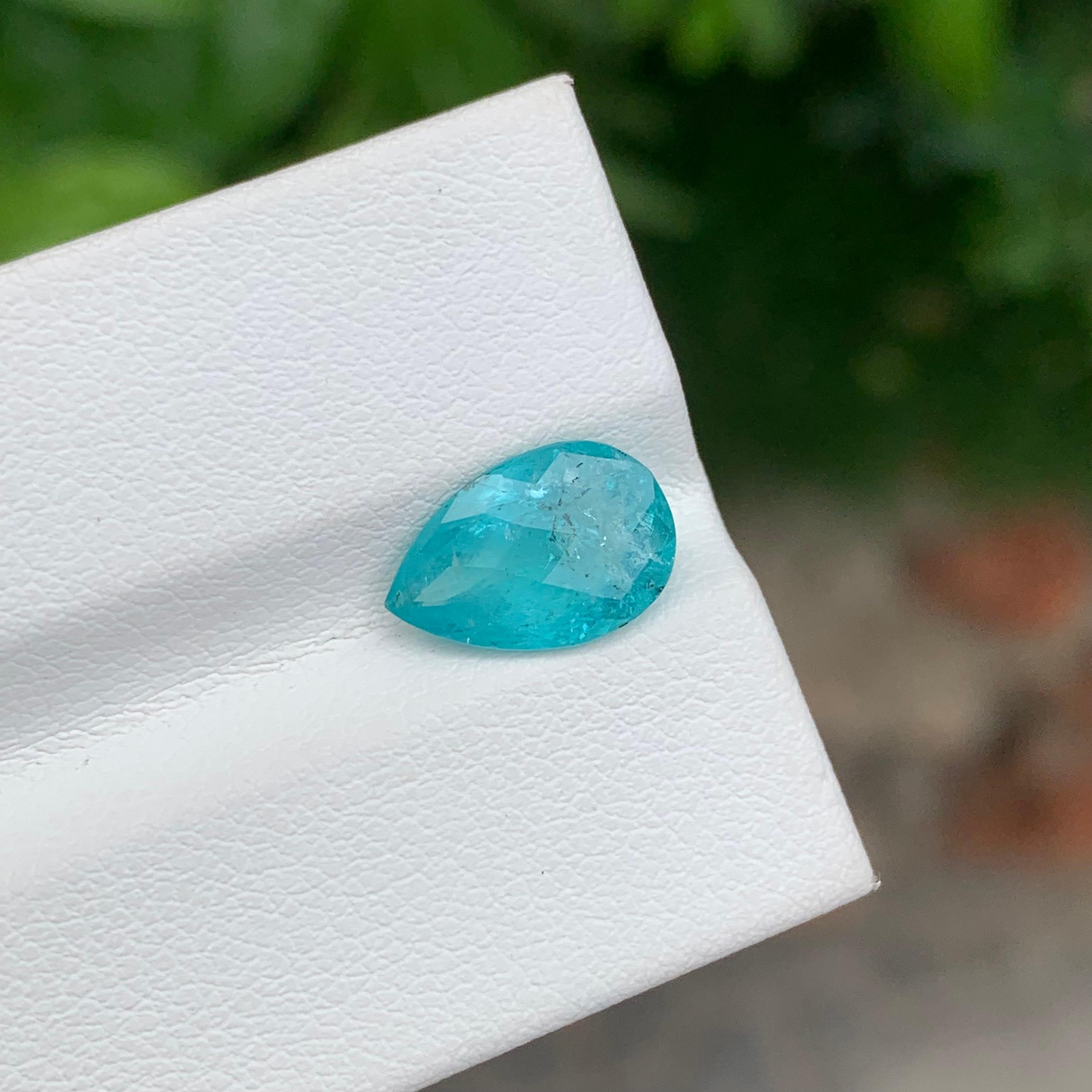 Loose Tourmaline ( Paraiba Color) 

Weight: 2.33 Carats
Dimension: 11.4 x 7.6 x 4.7 Mm 
Colour: Neon Blue 
Origin: Afghanistan
Certificate: Available 
Treatment: Non
Shape: Pear 


Tourmaline is a captivating gemstone known for its remarkable